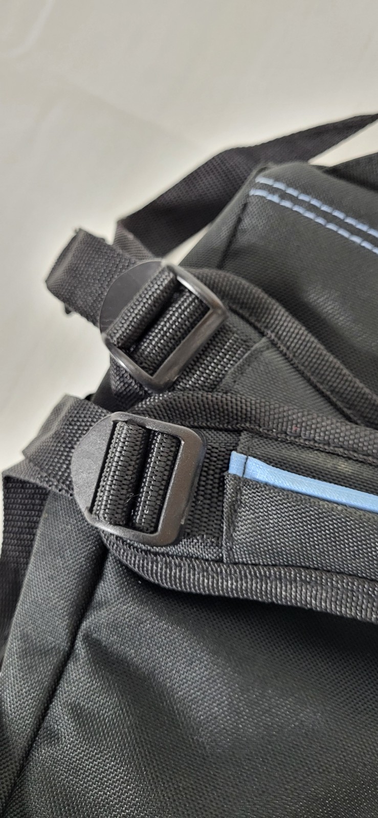 black and blue Reebok backpack