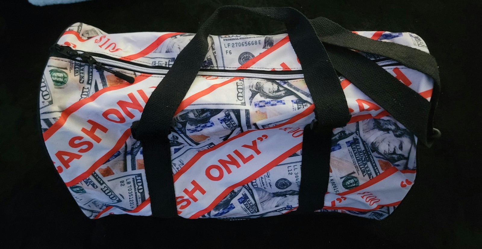 Cash Only Design Duffel Bag by Reason