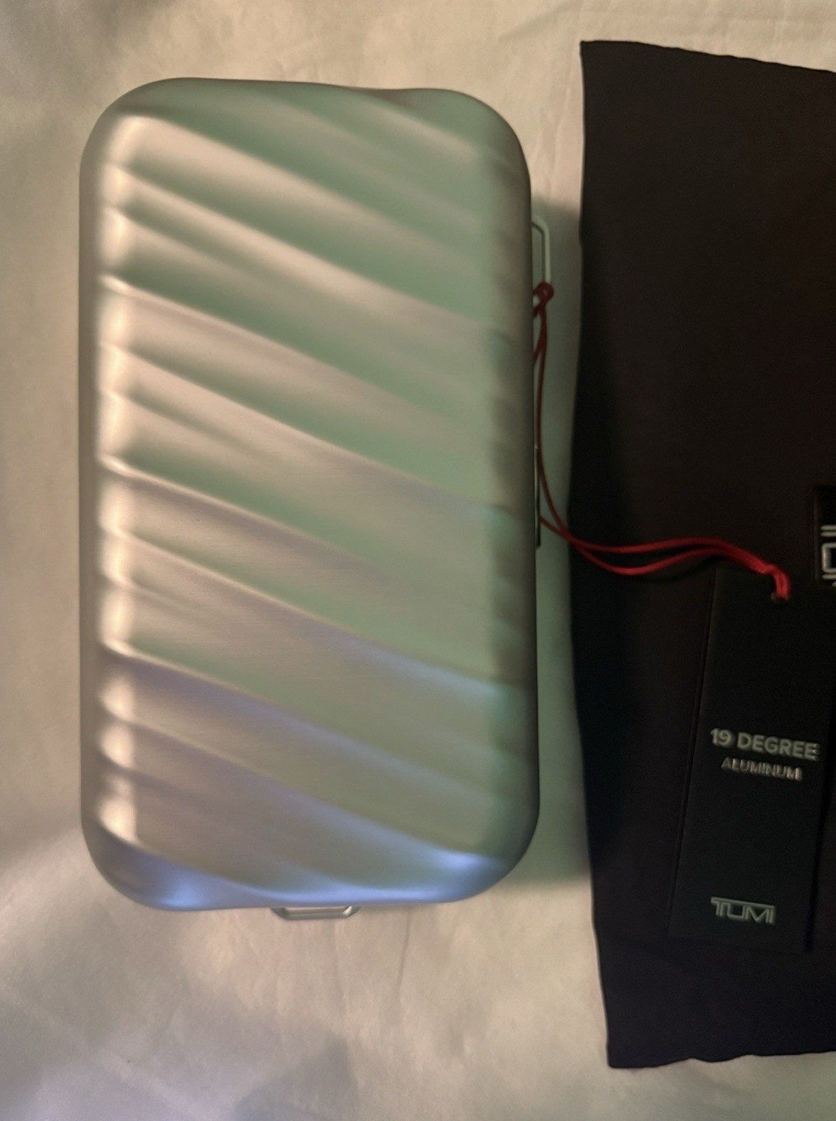 TUMI 19 DEGREE ALUMINUM Compact Sling in Silver
