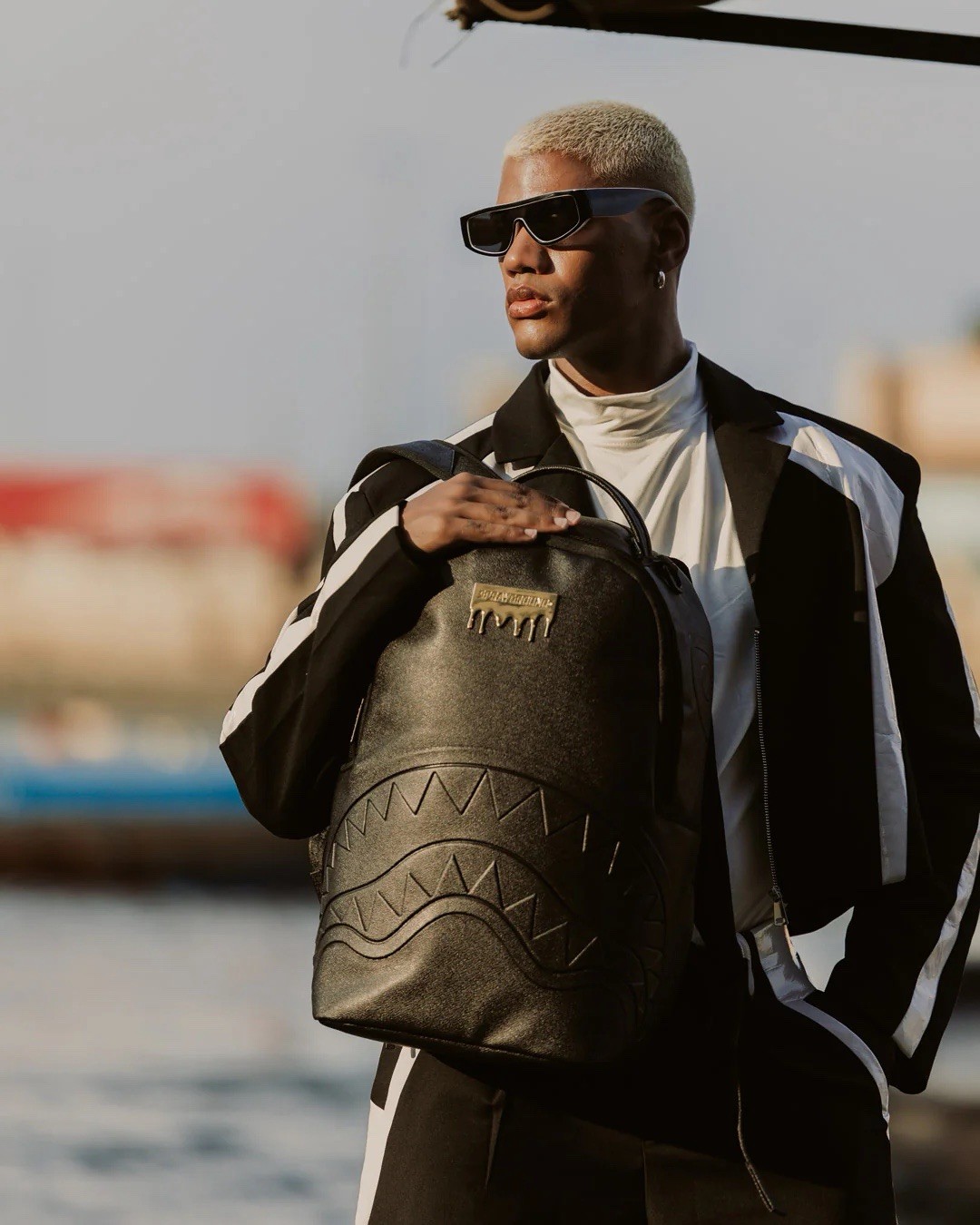 SPRAYGROUND LIMITED EDITION BACKPACK GOLD DRIP LOGO METALLIC BLACK FAUX LEATHER