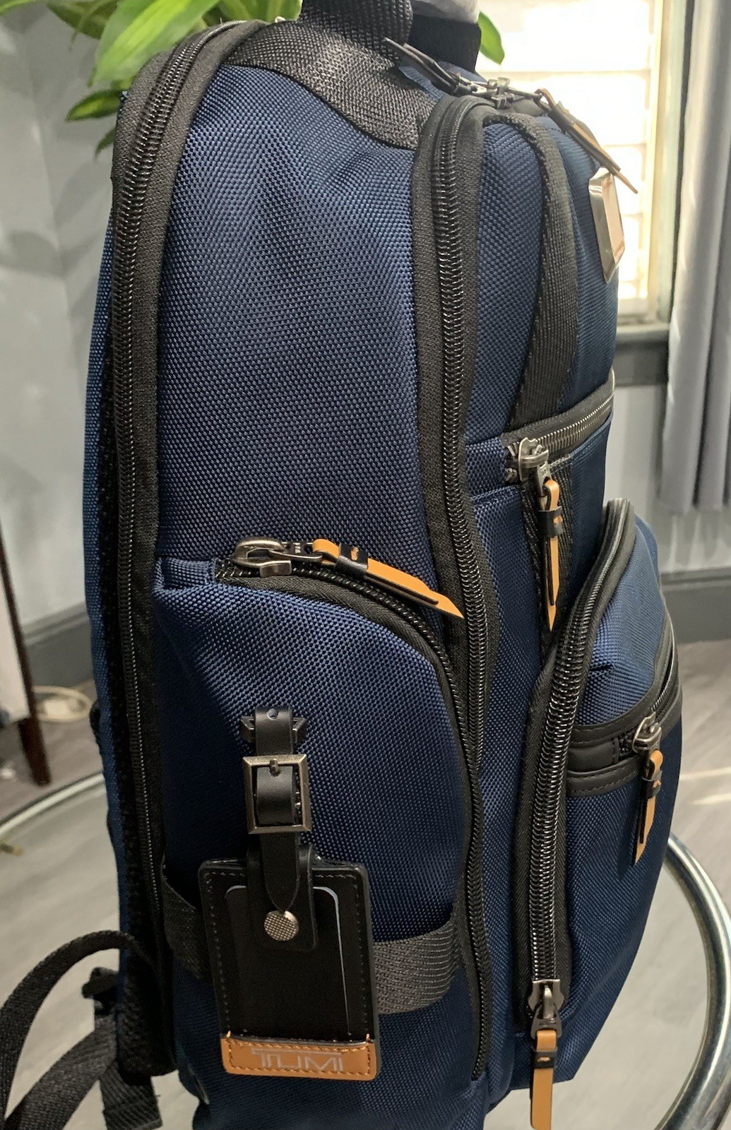 TUMI Alpha Bravo Sheppard Deluxe Backp-limited edition navy/tan accent color.