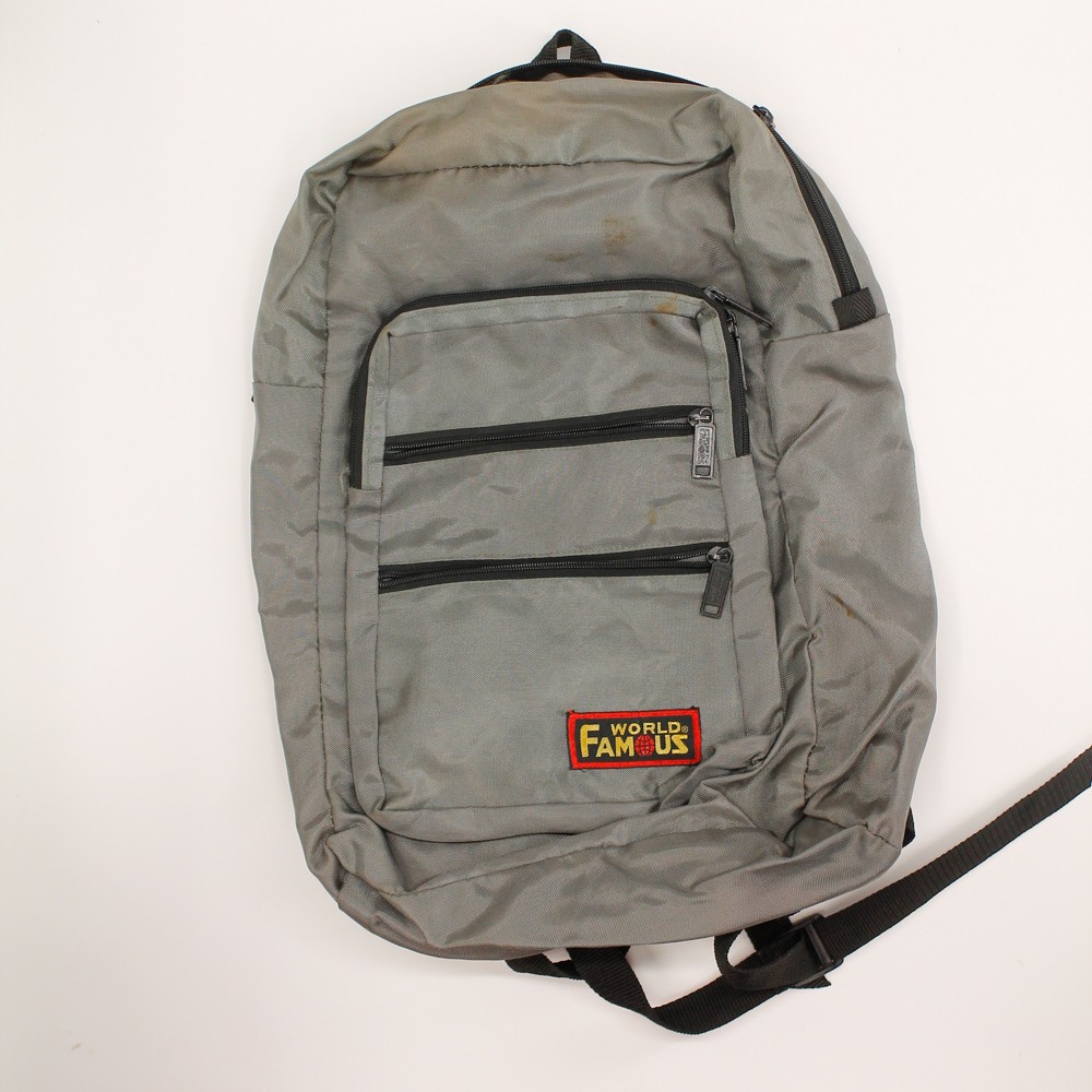 Vintage world famous grey black backpack 3 zip small zip pockets 1 large pocket