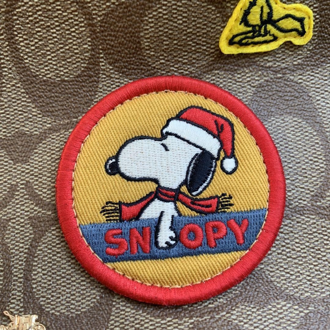 [COACH x PEANUTS] Dempsey Drawstring Backpack CE853, Signature Canvas, Patch