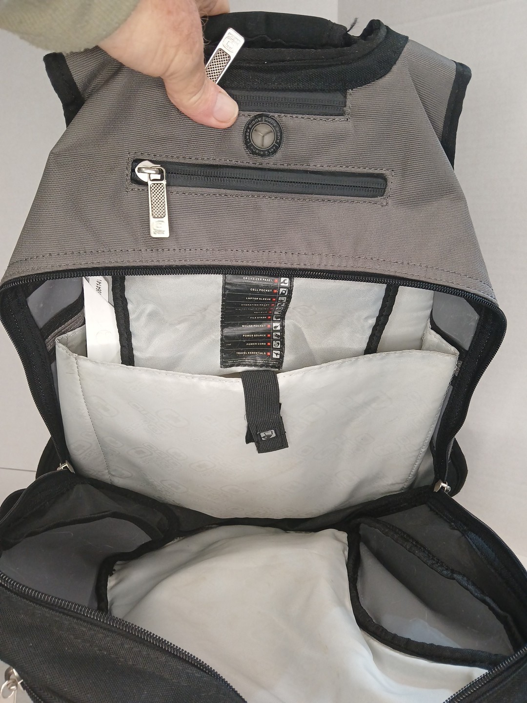 ogio backpack, Fugitive.Laptop compartment and phone compartment with cable port