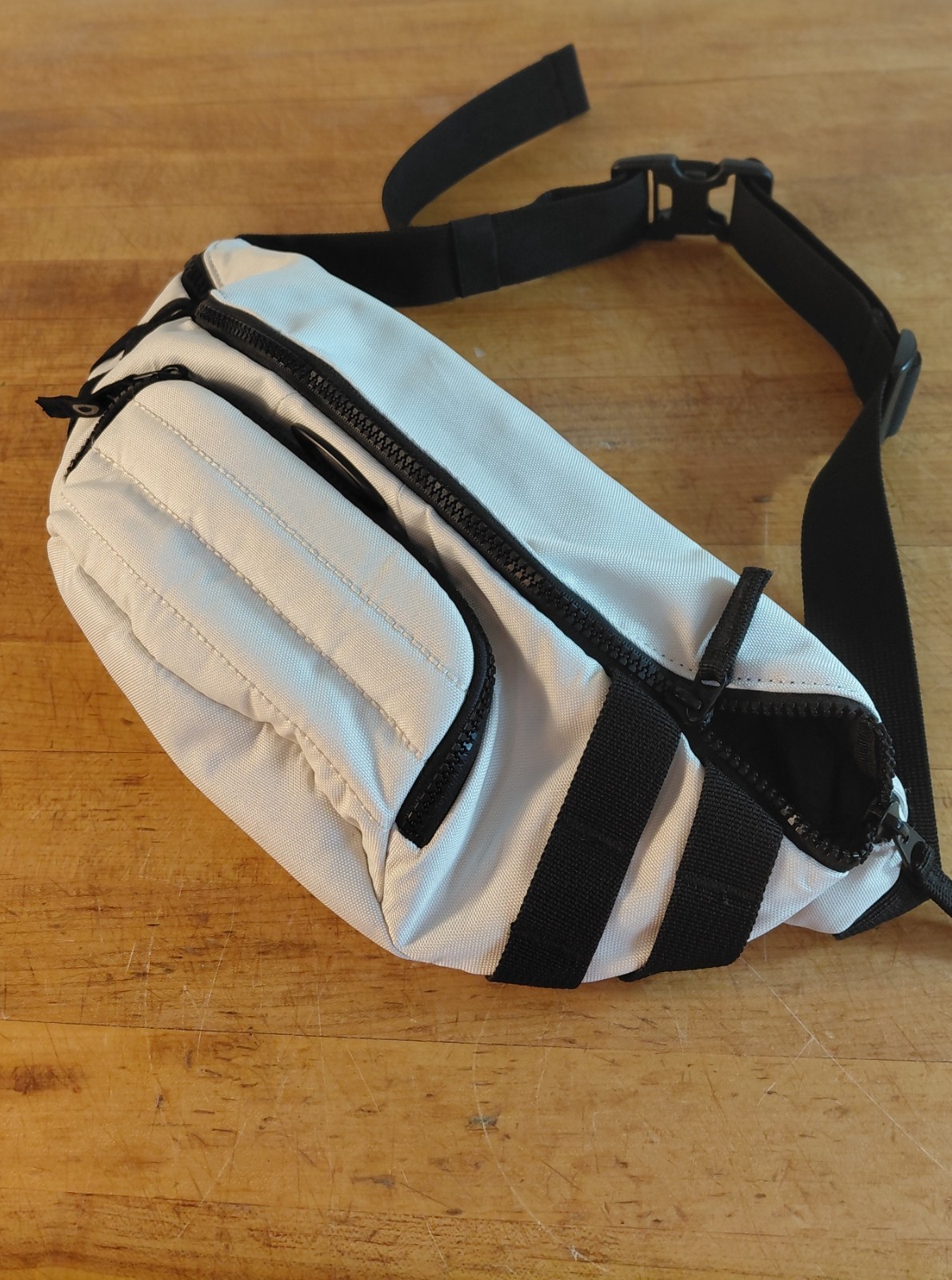 Oakley Off White Belt Bag. Size 41cm. Adjustable Black Strap