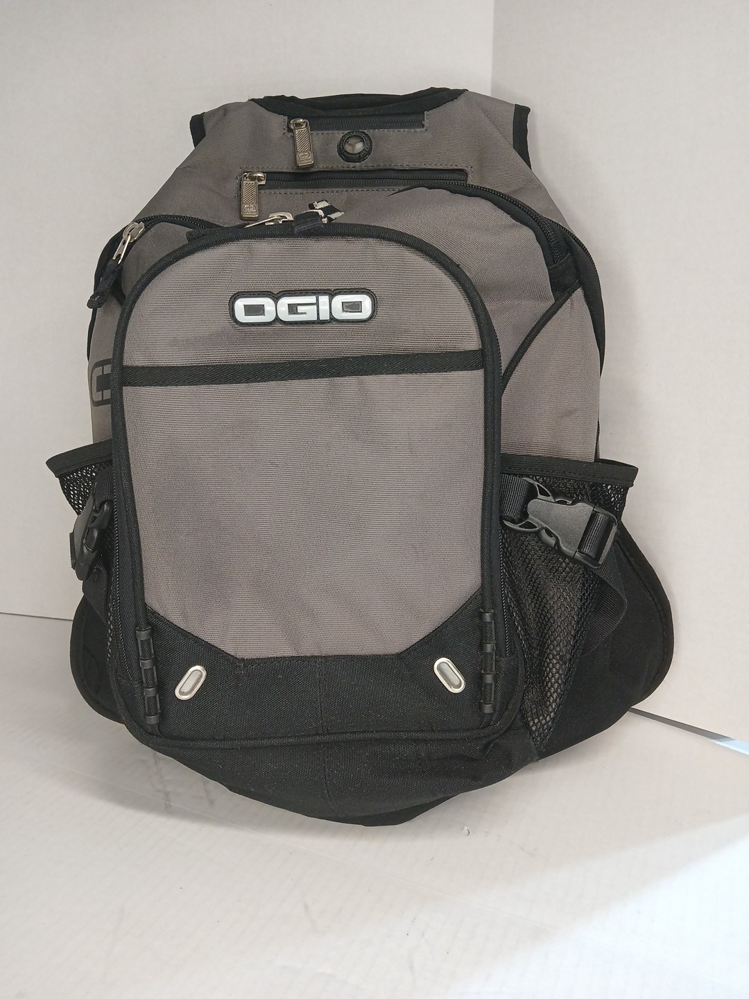ogio backpack, Fugitive.Laptop compartment and phone compartment with cable port