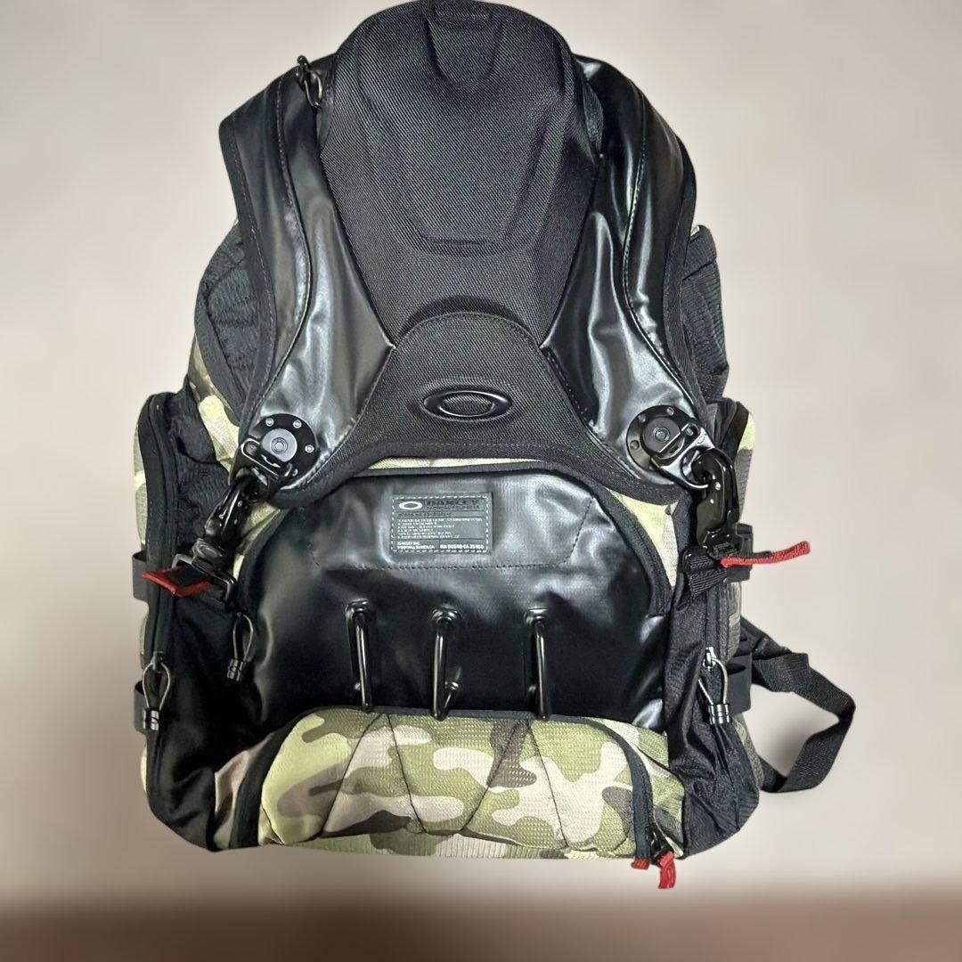 OAKLEY Kitchen Sink Backpack Camouflage Rare Used Travel Hiking Bag