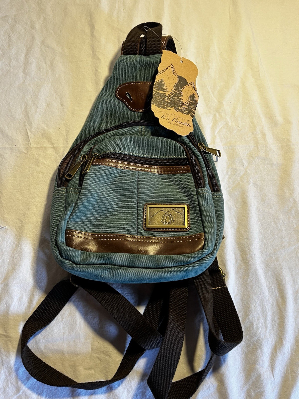 Leisure Sling Bag Backpack Green Brown Zip Closure Outer Pockets Adjustable