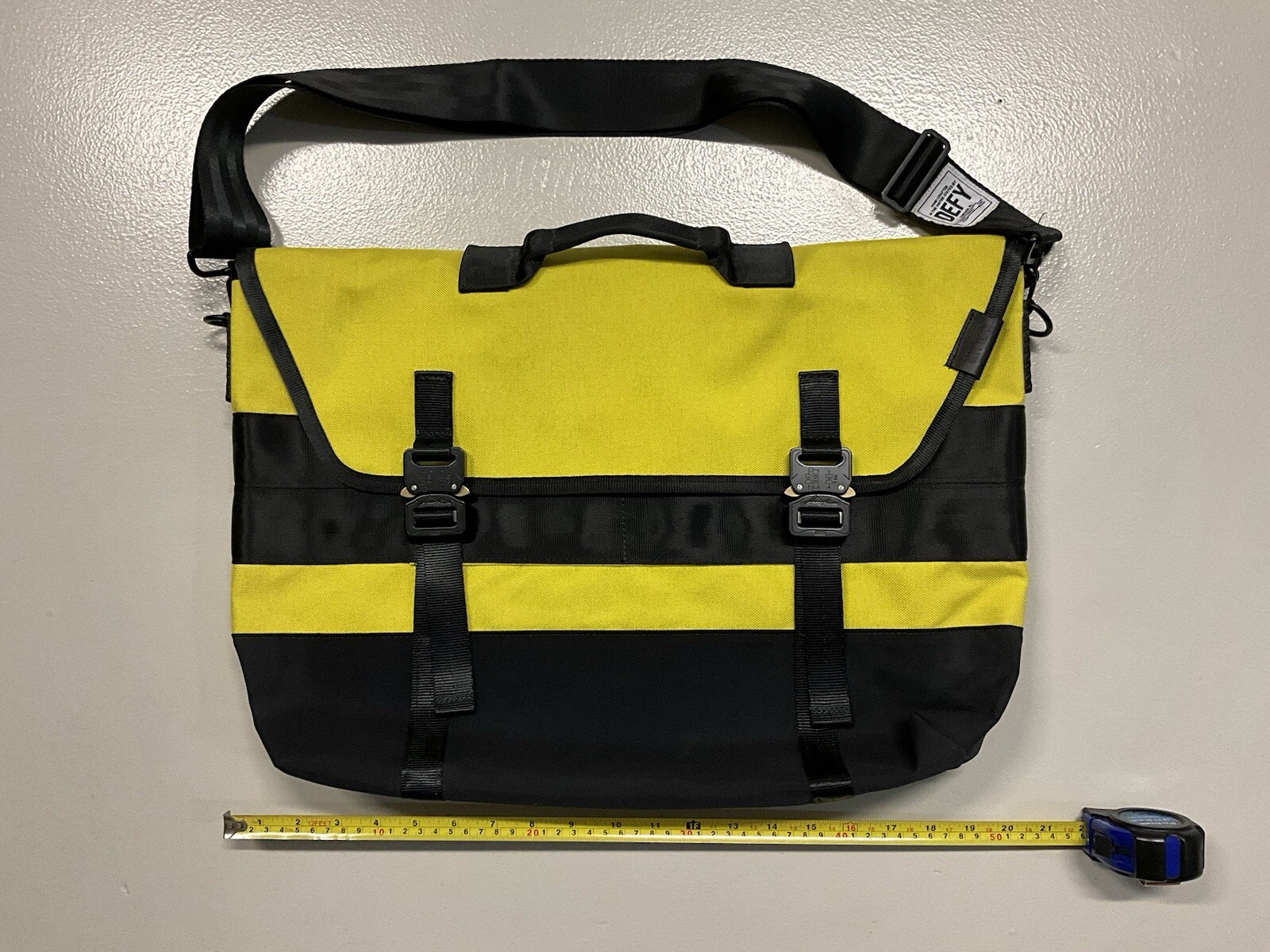Defy Messenger Bag with cobra buckles