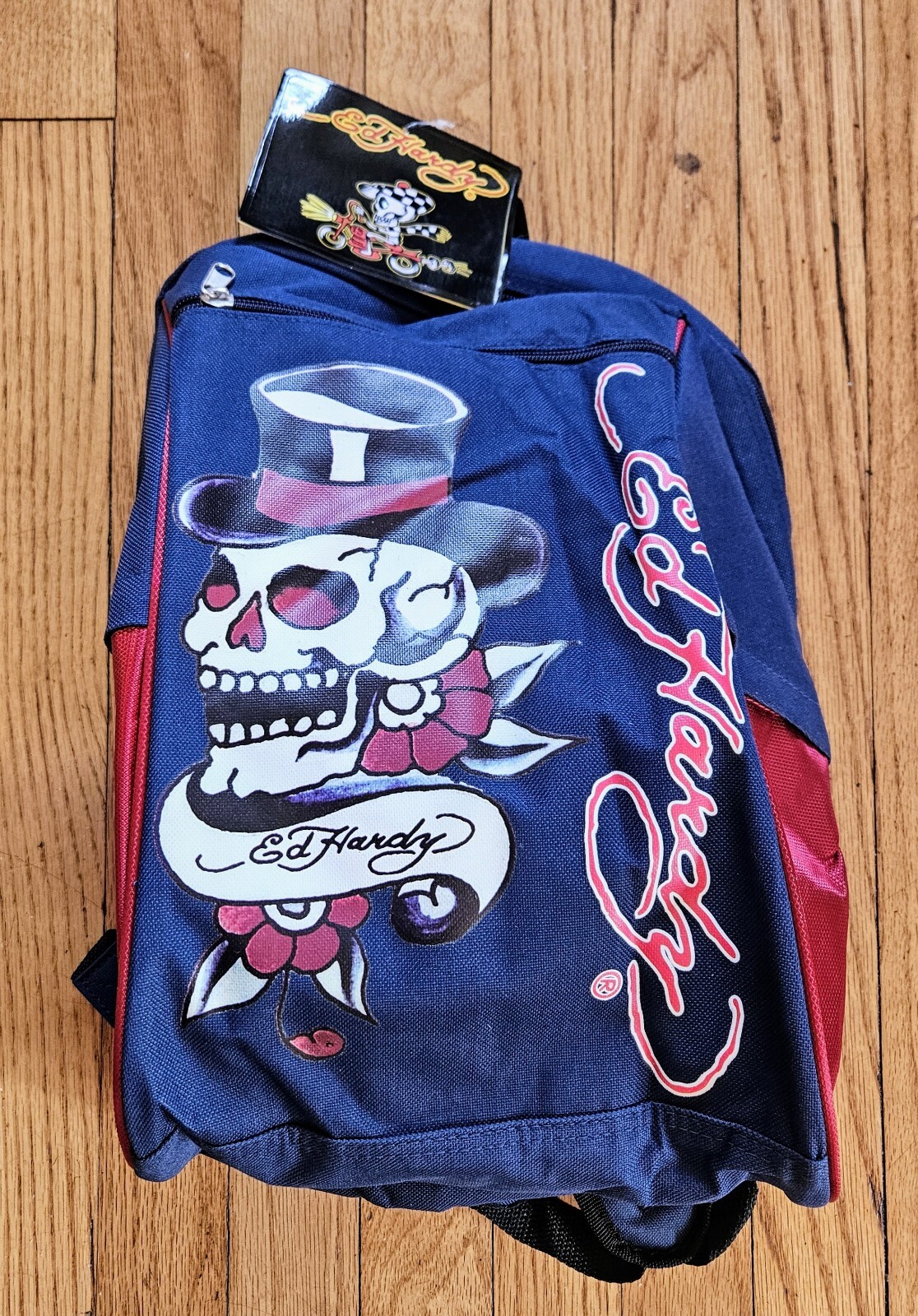DON ED HARDY Skull With Top Hat Zip Top Carry Loop Backpack Navy & Red Unisex