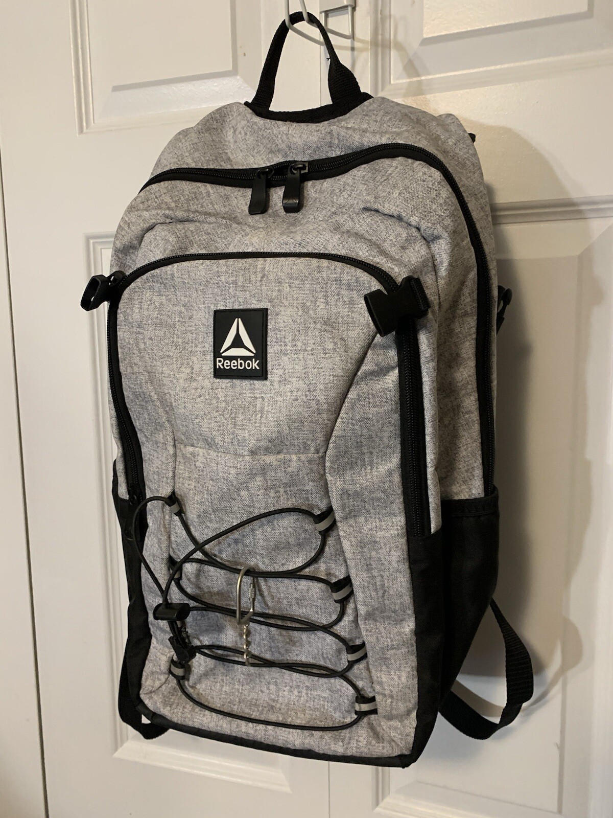 Reebok Unisex Adult Roman 19.5″ Laptop Bungee Backpack, Light Heather Grey