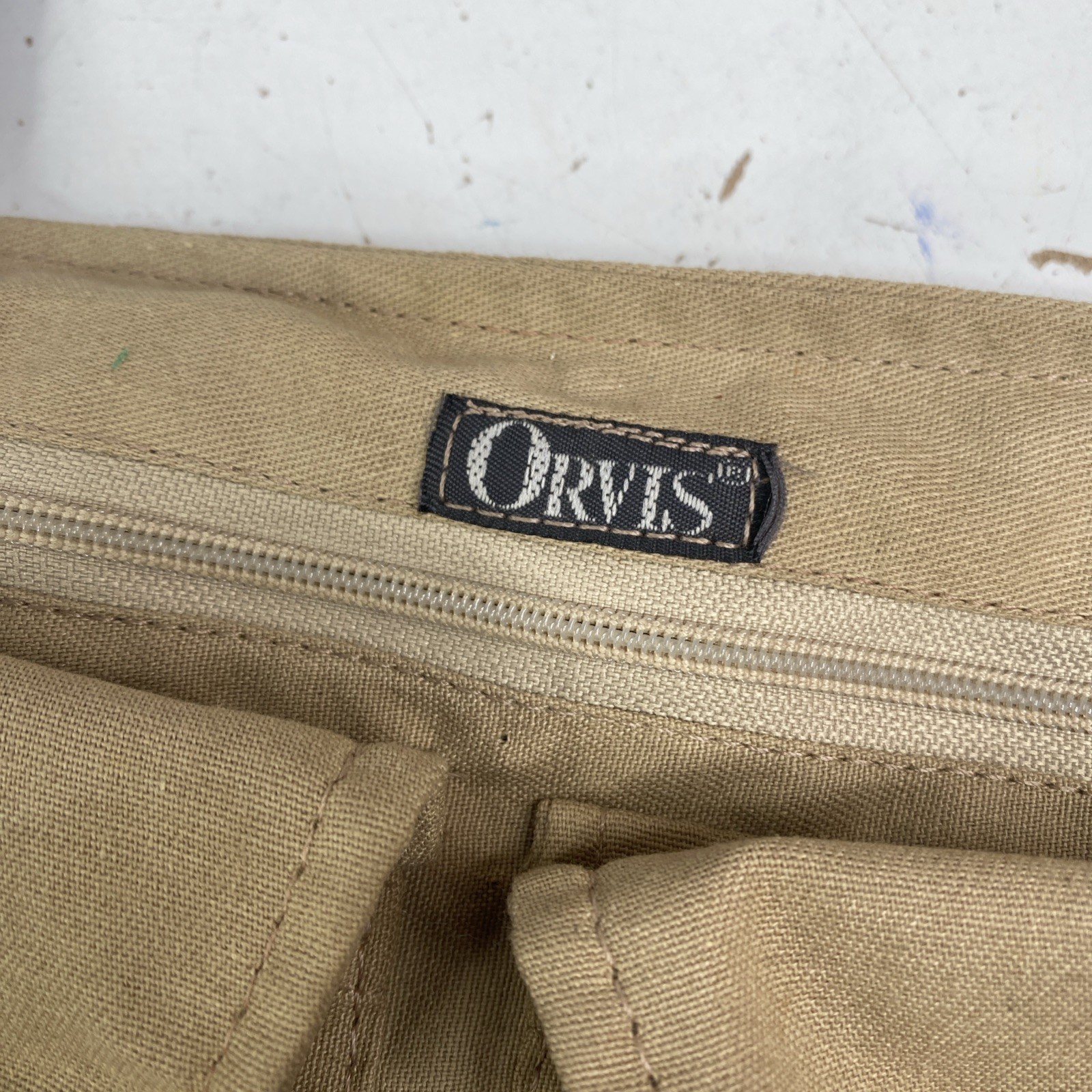 Orvis hanging accessory bag with plastic buckles insulated hand warmer pockets