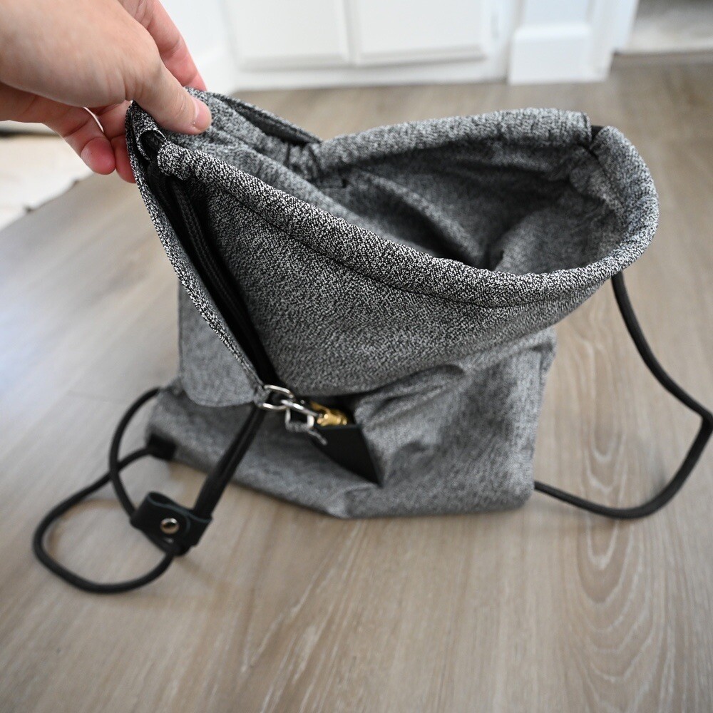Slash Resistant Drawstring Bag With Top Flap & Locking Mechanism | Anti Theft