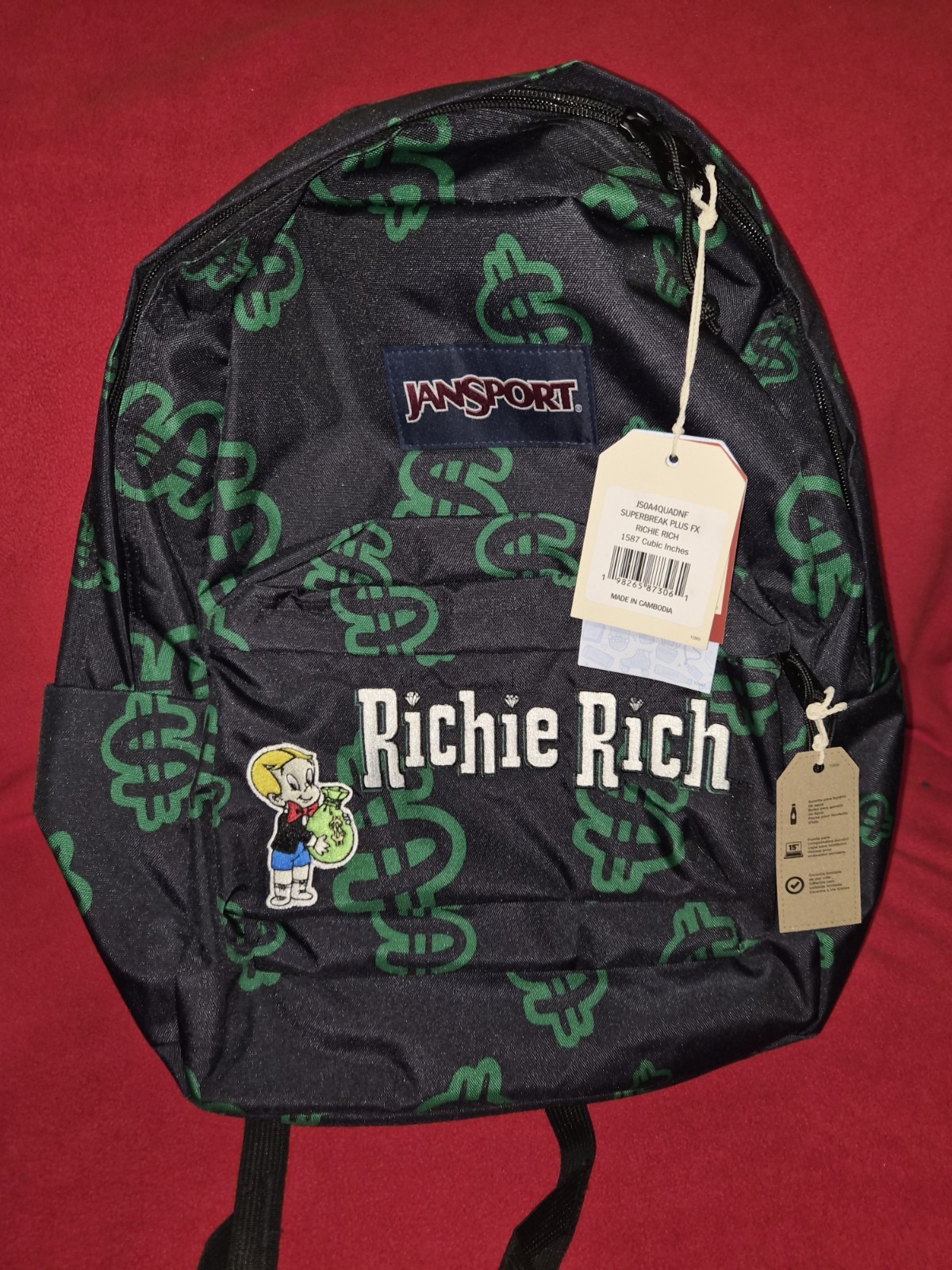 JANSPORTRICHIE RICH DOLLAR SIGNS MENS BACKPACK (BLACK/GREEN)