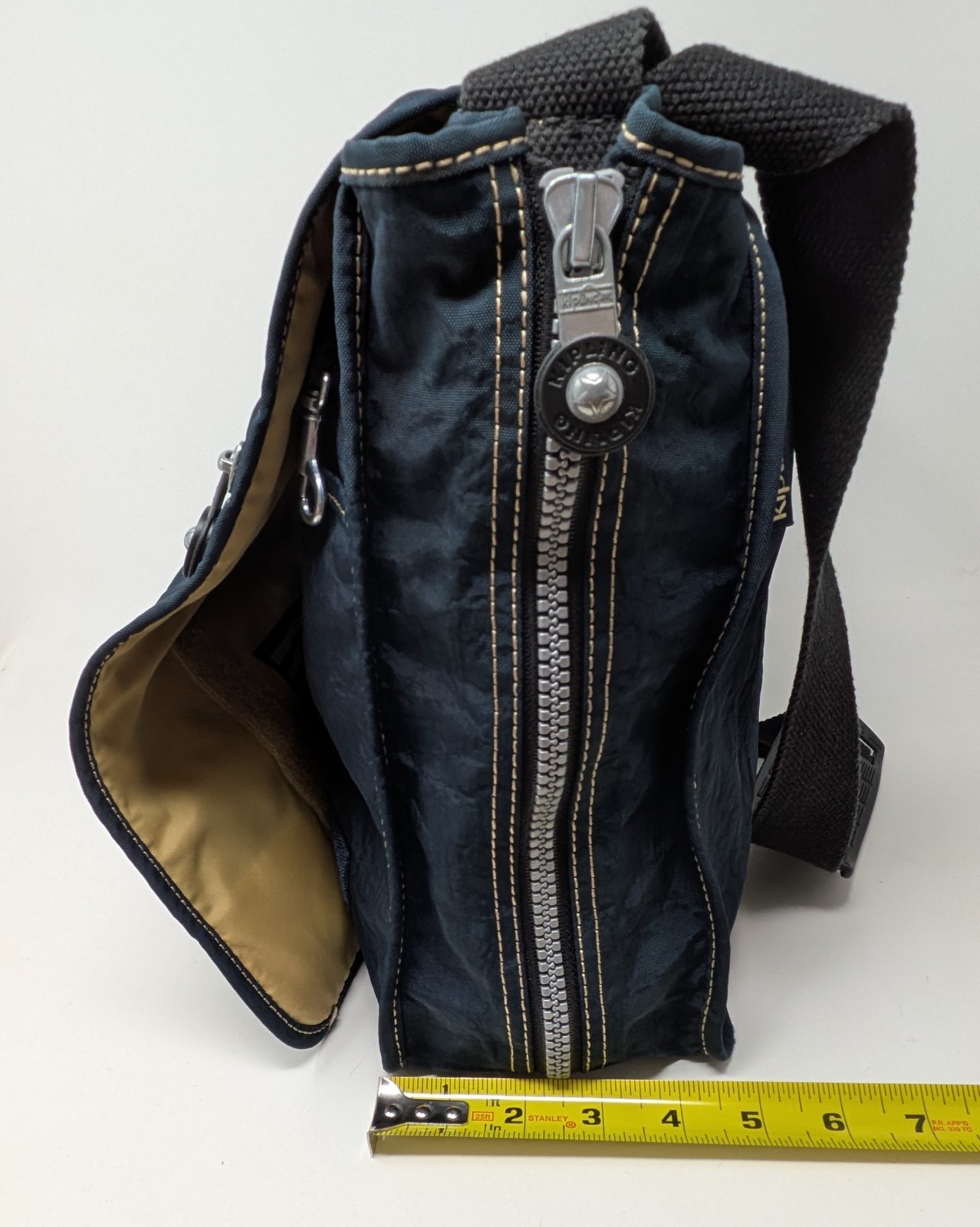 Kipling Madhouse Postman Bag Mirage Las Vegas Logo Expandable Messenger Bag Blue