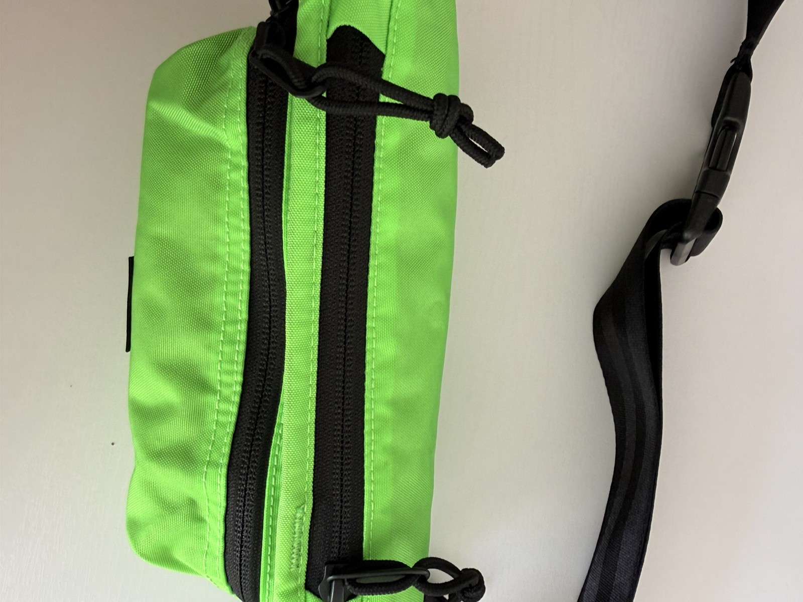 The Brown Buffalo Conceal Waistpack Sling Ultra Neon Green Grid TBB Fanny Pack