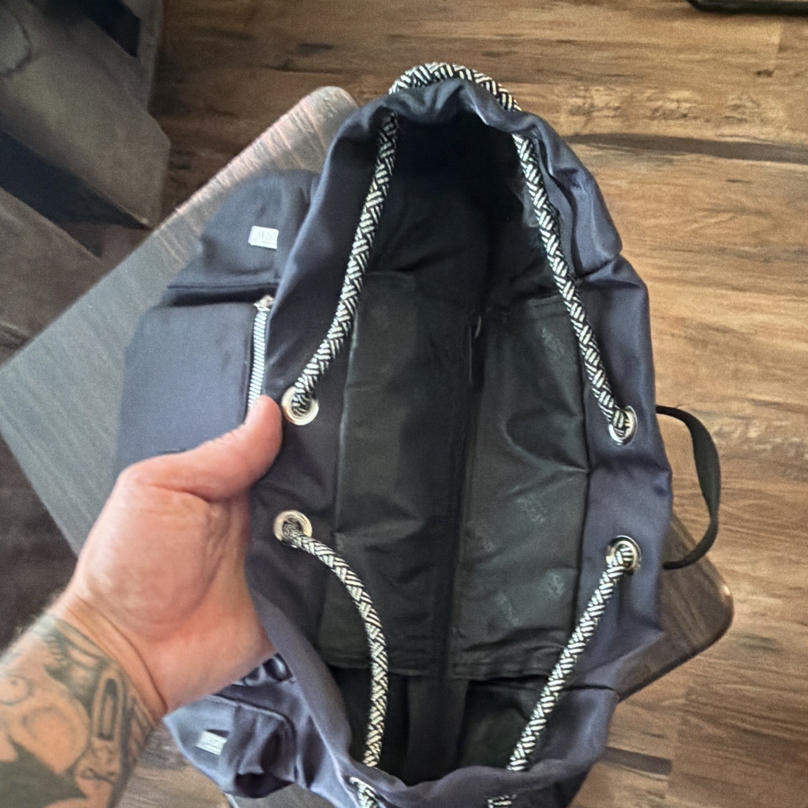Versace Black Drawstring Backpack w/ Front Zip Pocket, Adjustable Straps