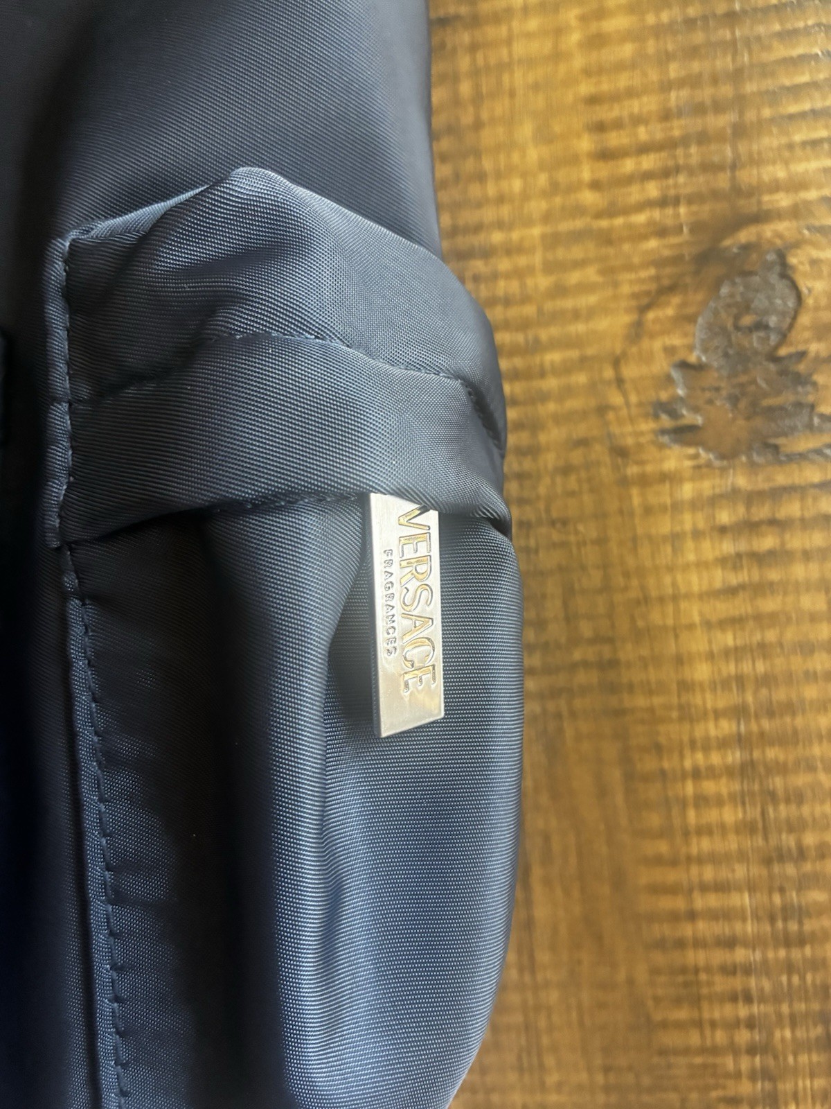 Versace Parfums Black Drawstring Backpack w/ Front Zip Pocket, Zip Closure