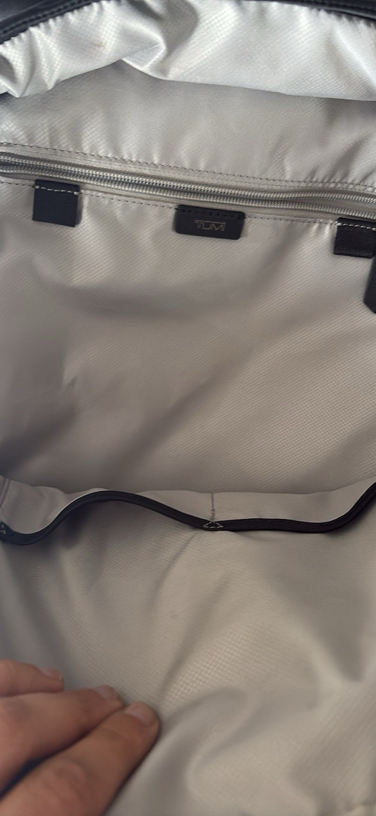 TUMI Black Backpack, Zip Closure, Adjustable Straps, Pockets, Top Handle