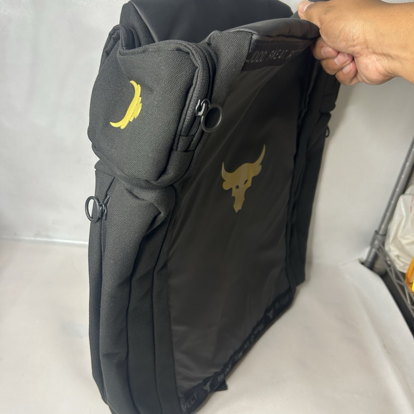 UA Under Armour Project Rock Duffle Backpack Bag Black Gold Gym 1376459-002 39L