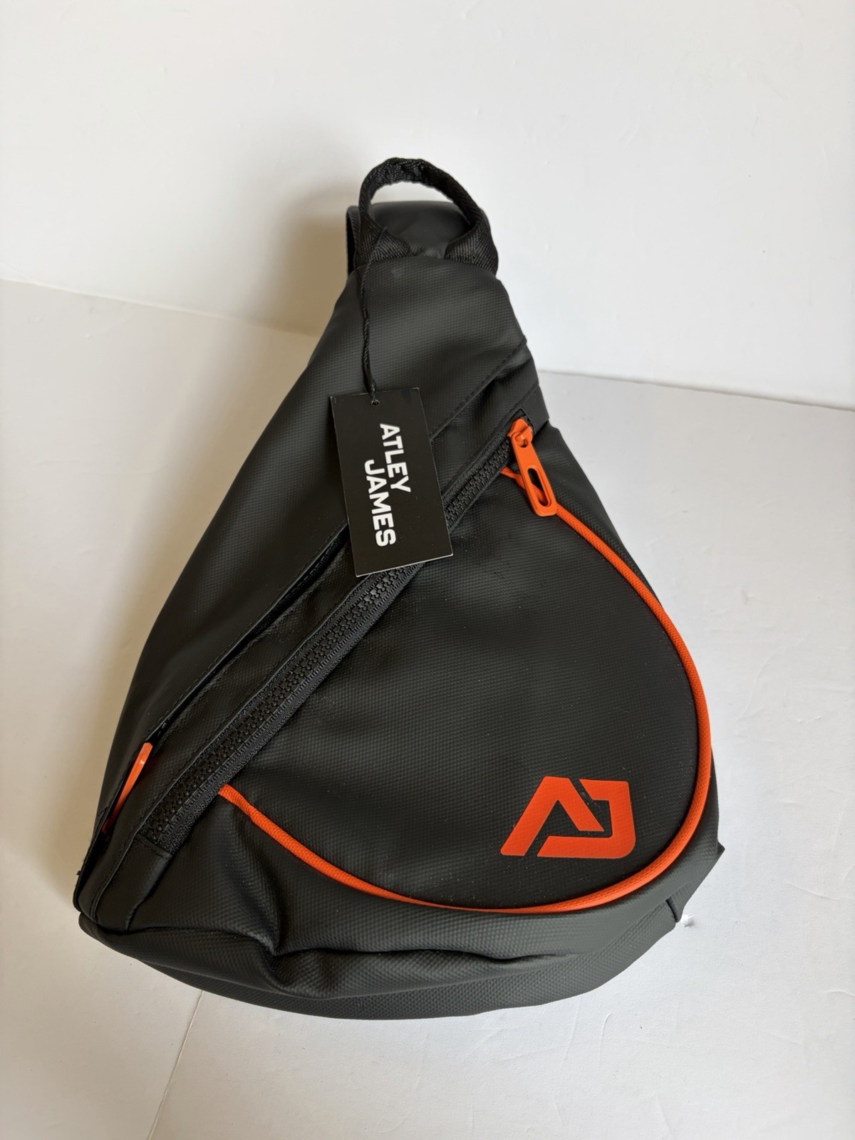 ATLEY JAMES black sling backpack