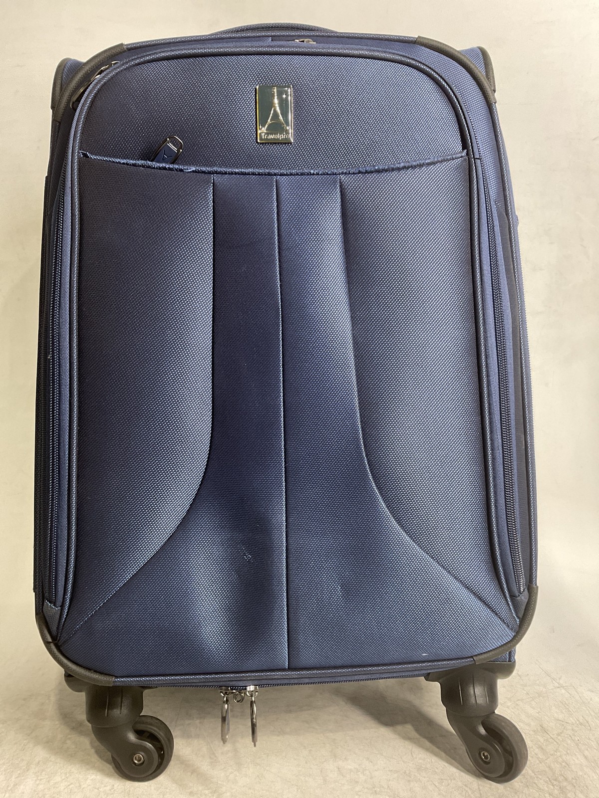 Travelpro Softside Expandable Luggage with 4 spinner wheels blue U1