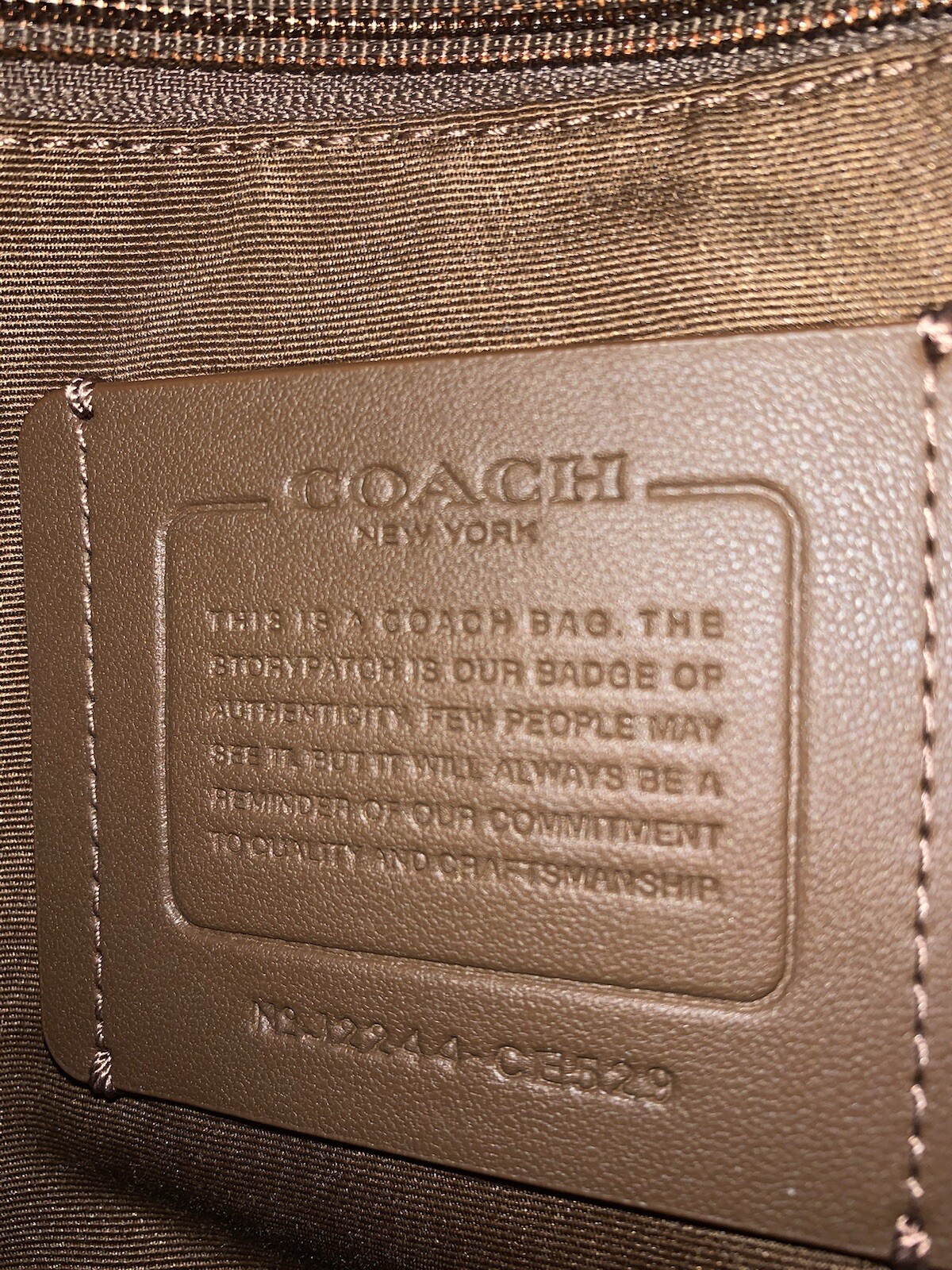 COACH Track Sling Backpack in Colorblock with Stamp in Red Ivory Orange