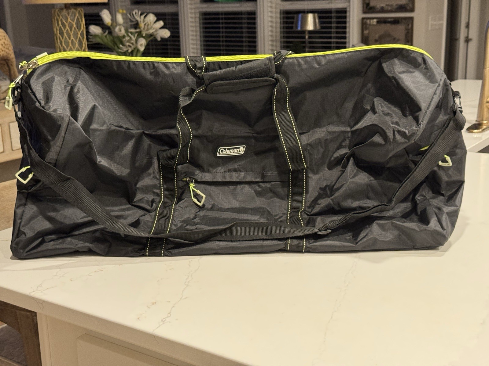 Coleman Flex Duffel Bag. Black and Neon Green with Shoulder Strap.