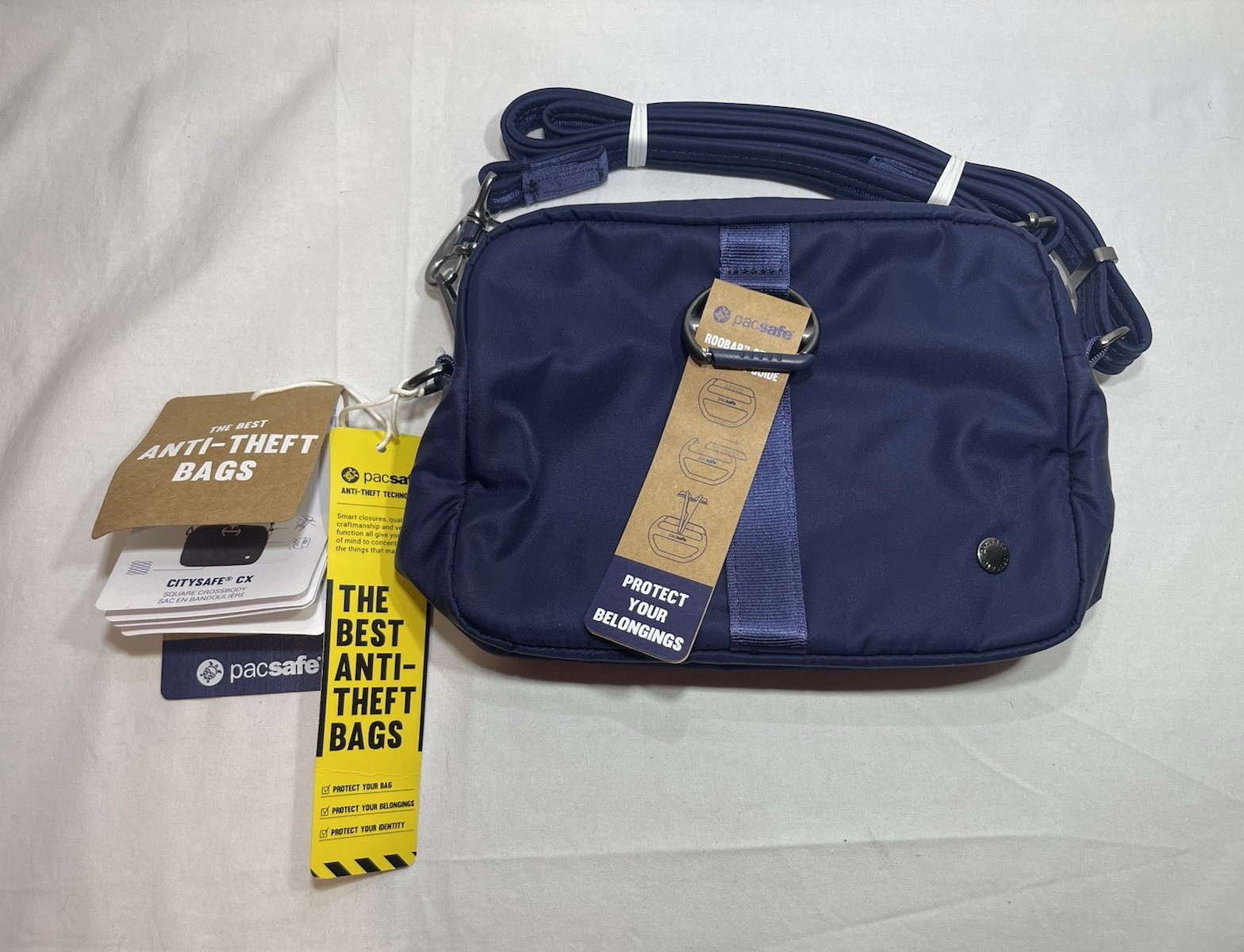 Pacsafe Blue Anti-Theft Crossbody Bag Zip Closure Small Adjustable Strap