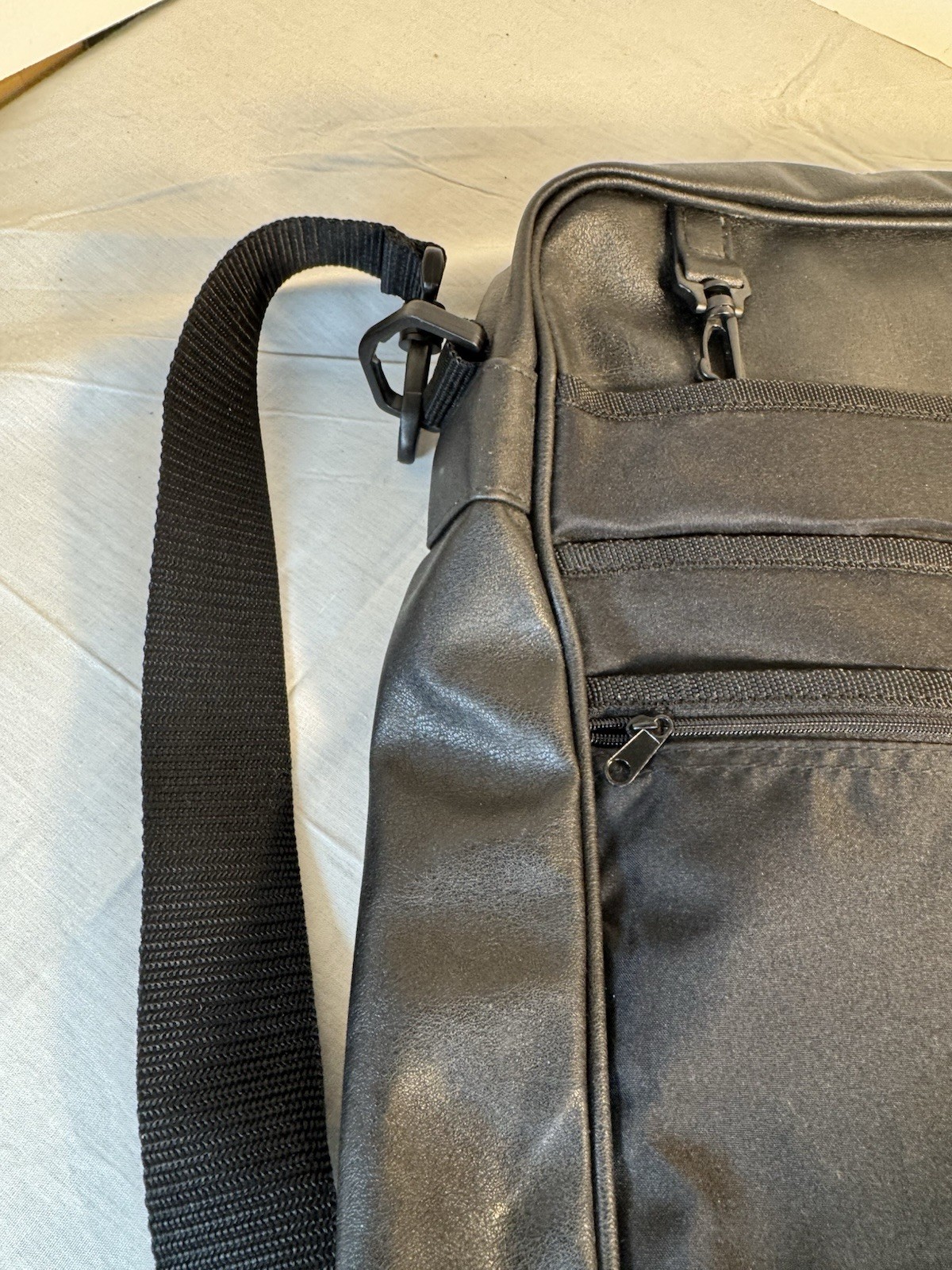 Solid Black leather messenger bag With Inside Pockets And Back Pack Handles