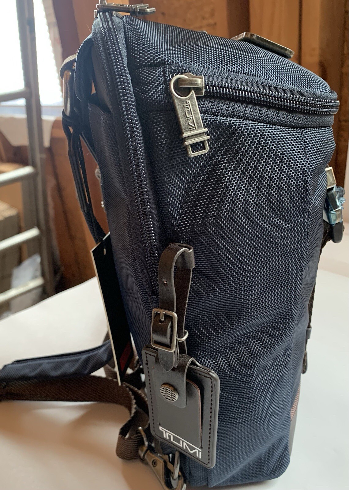 Tumi Alpha Bravo Woodland Sling/Backpack. Style NWOT $345 NAVY