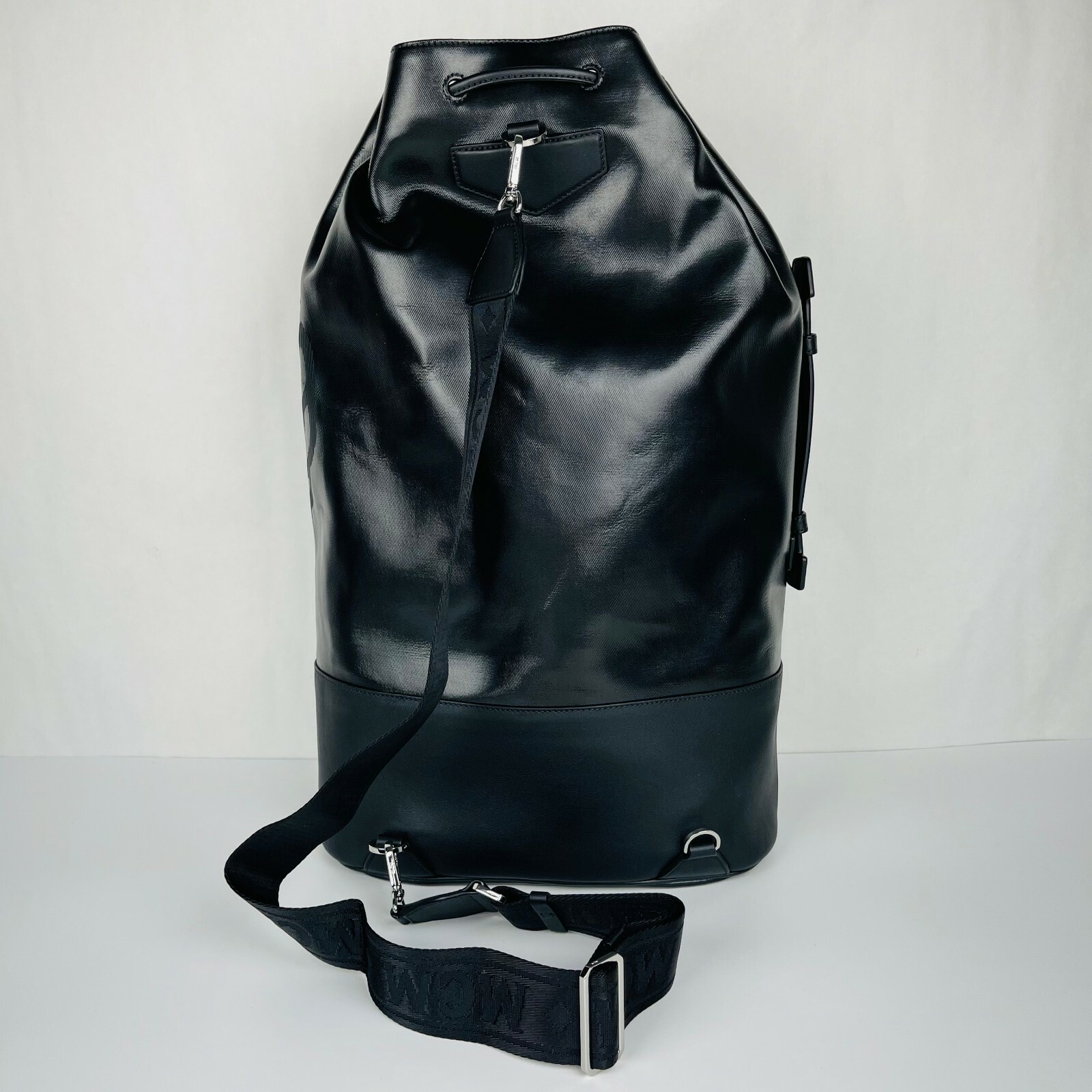 with tags $1120 MCM Tivitat Black Coated Canvas Large Drawstring Backp G1N