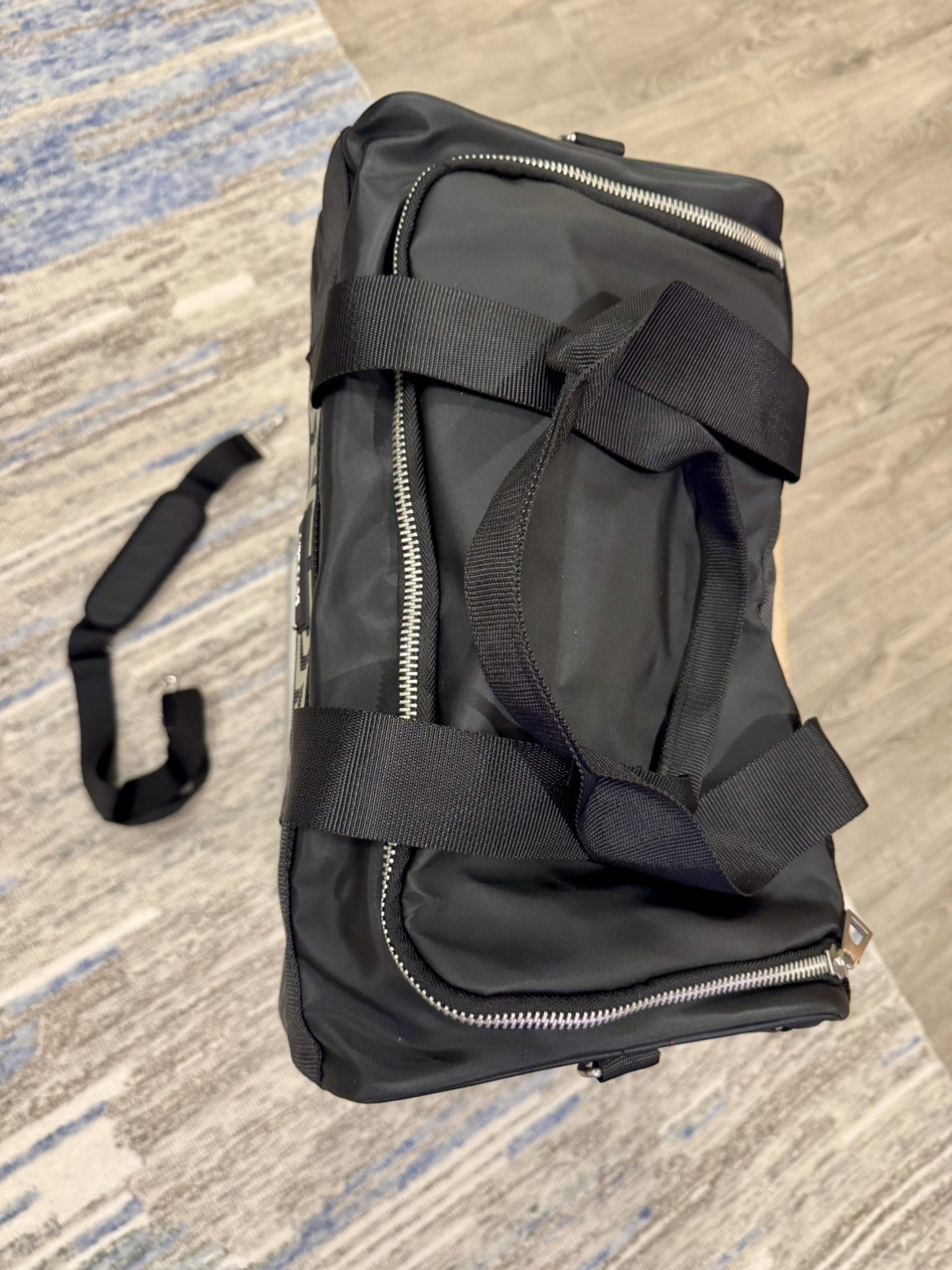 Versace Fragrances Black Duffle with Silver Tone Zipper Travel Overnight Gym Bag