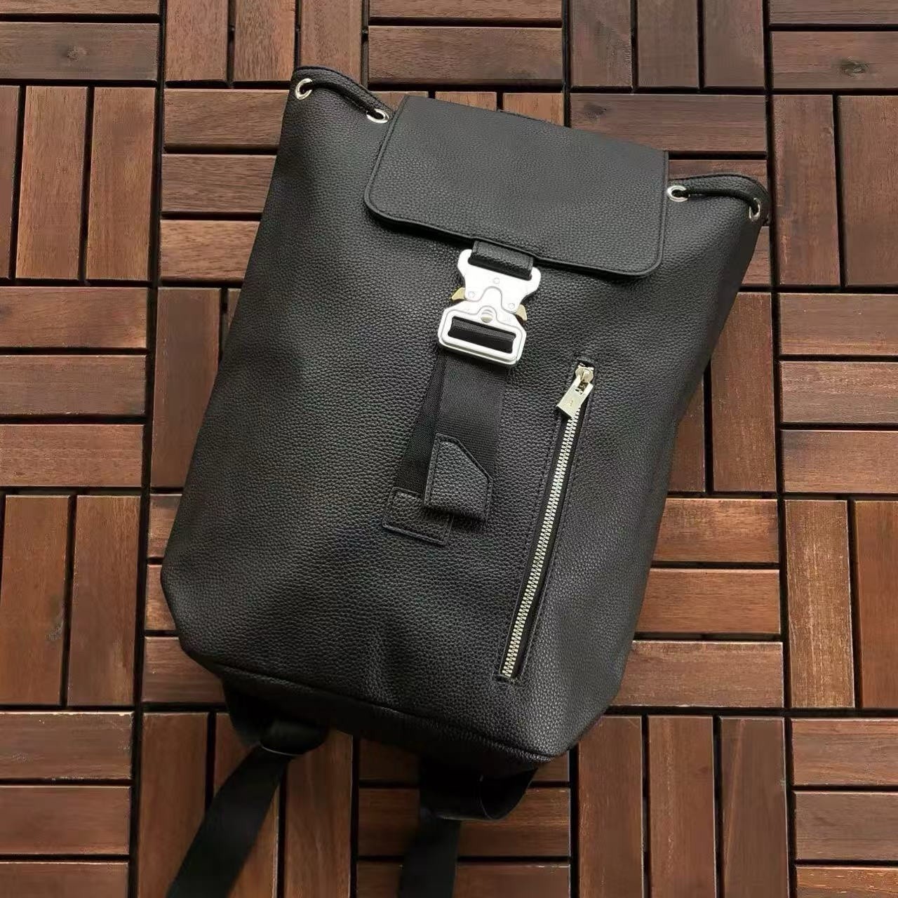 1017 ALYX 9SM Black Pebbled Leather Buckle Backpack Front Zip Drawstring Bag