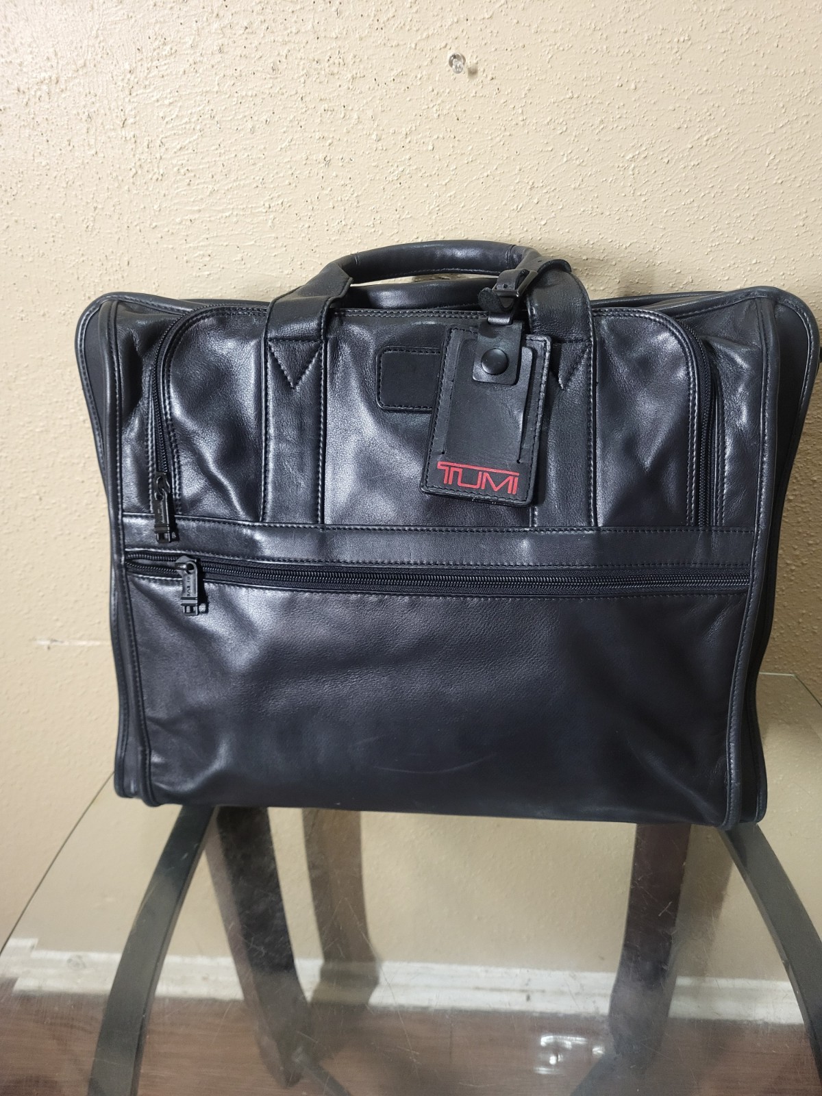 Tumi Black Large Leather Briefcase. Condition Is Very Good.