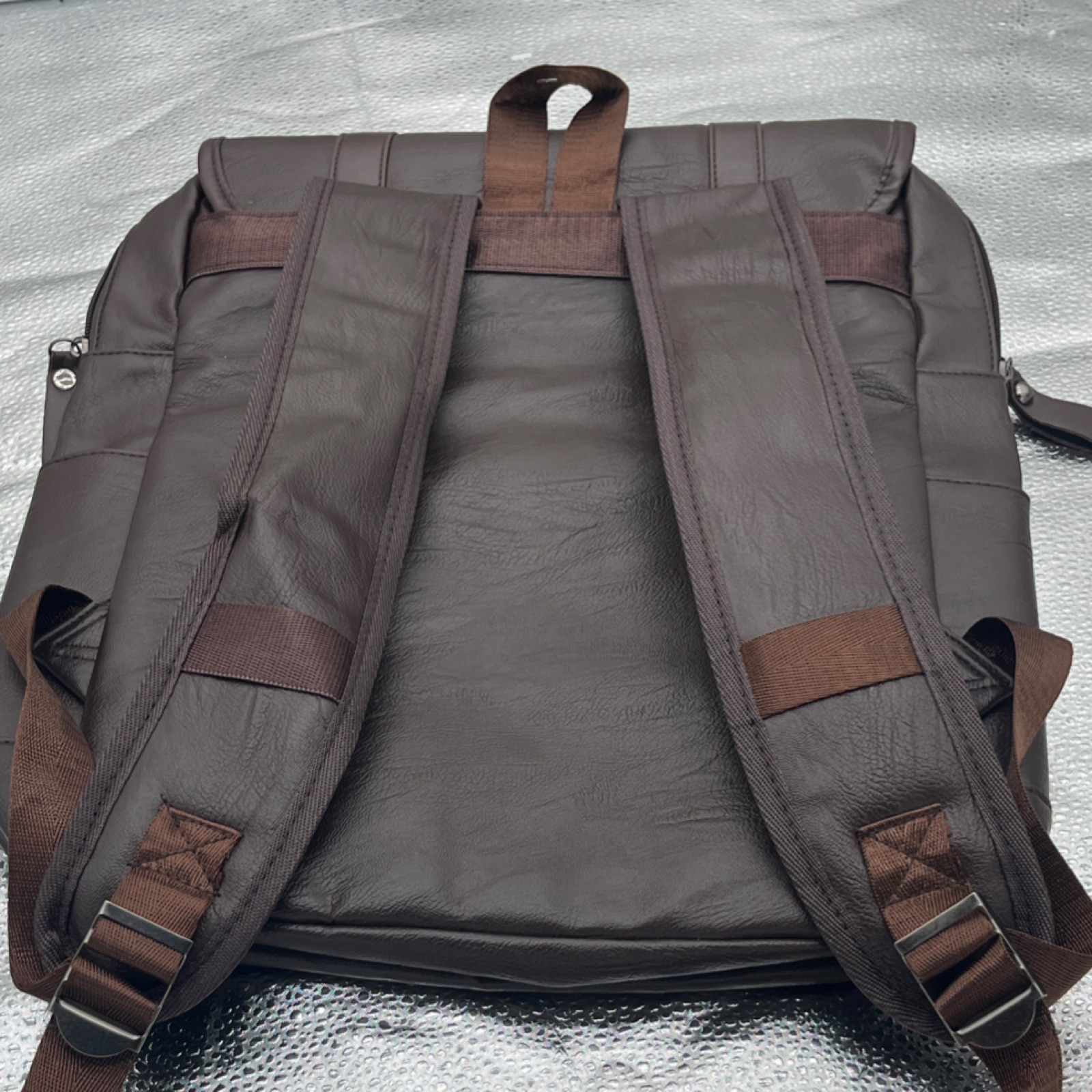 Brown Men’s Backpack with Buckle, Zip, and Snap Closure for Casual Travel