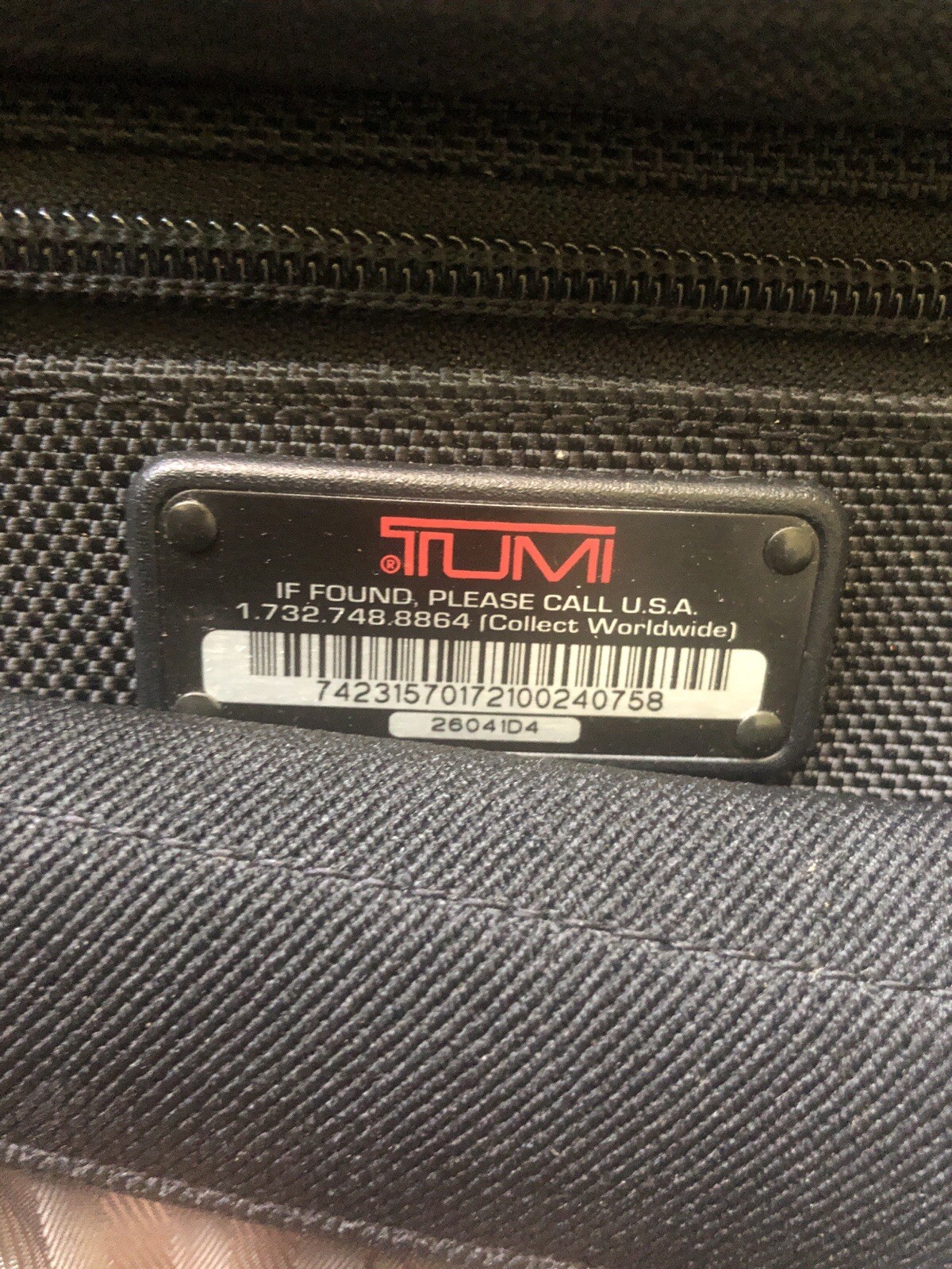 TUMI Model Number: 26041D4 Expandable Organizer Nice condition with shoul strap