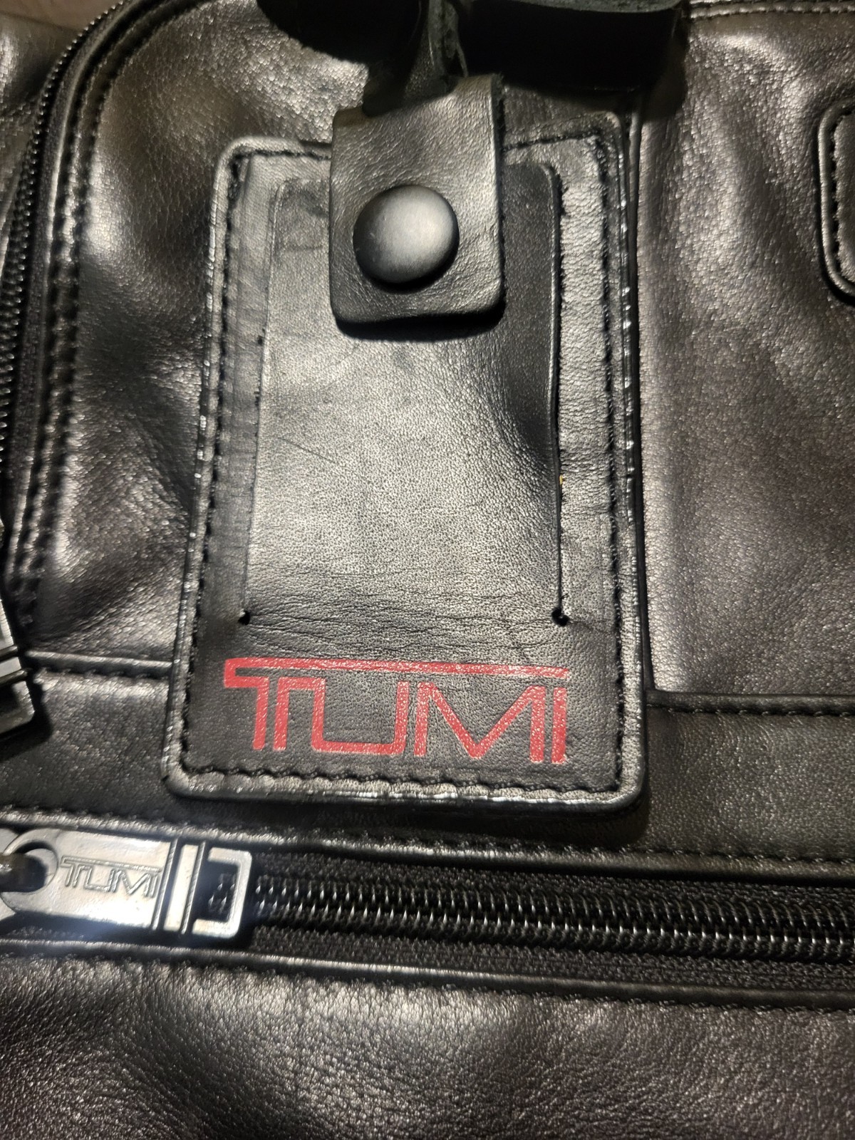 Tumi Black Large Leather Briefcase. Condition Is Very Good.