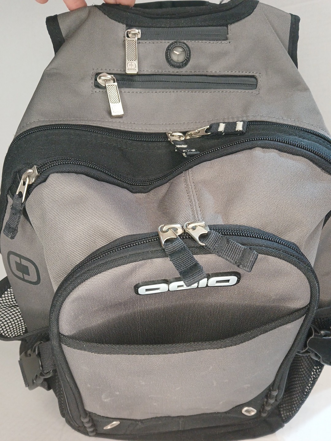 ogio backpack, Fugitive.Laptop compartment and phone compartment with cable port