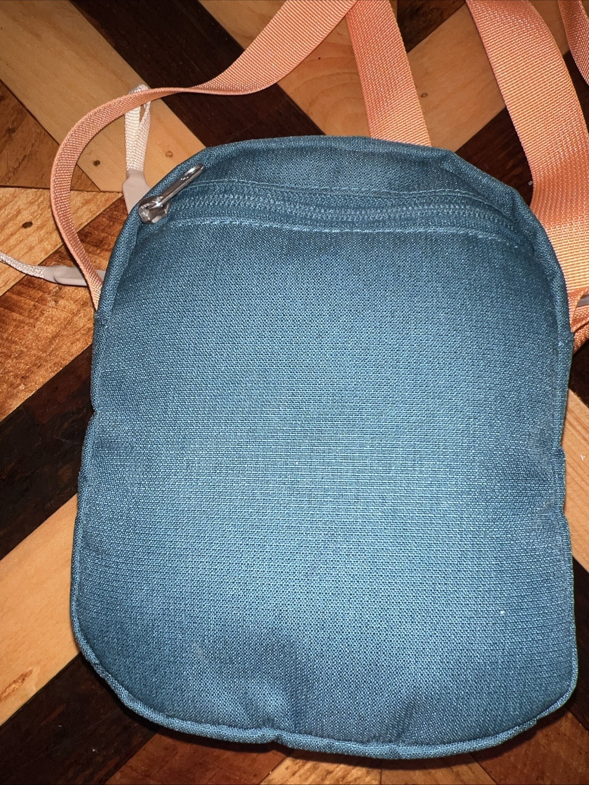 The Northface Men’s Small Crossover Bag In Blue And Coral Orange