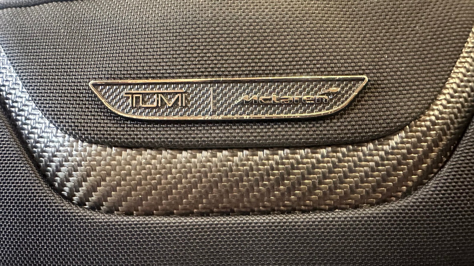 Tumi McLaren Lumin Utility Pouch Sling Crossbody Waist Bag Black Orange Travel