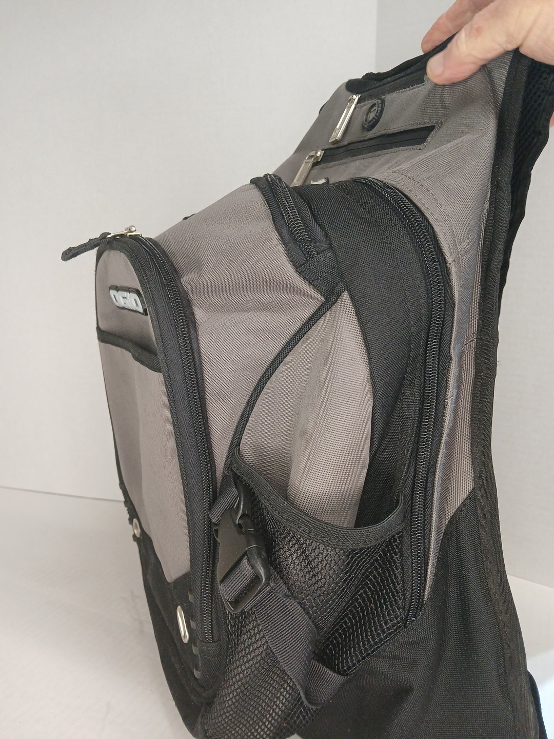 ogio backpack, Fugitive.Laptop compartment and phone compartment with cable port