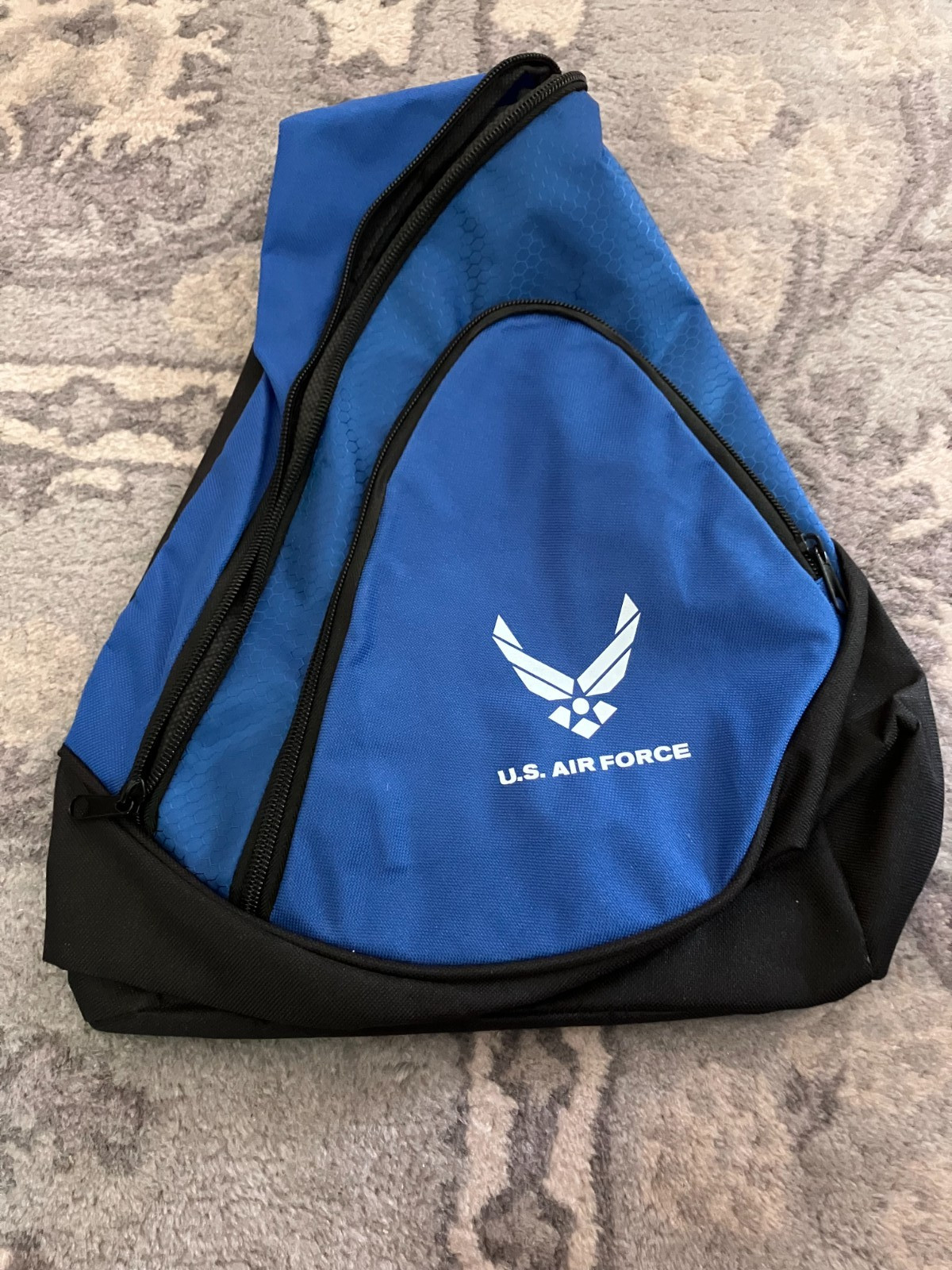 U.S. Air Force Sling Backpack Blue New w/Accessories Charger Power Bank Dog Tag