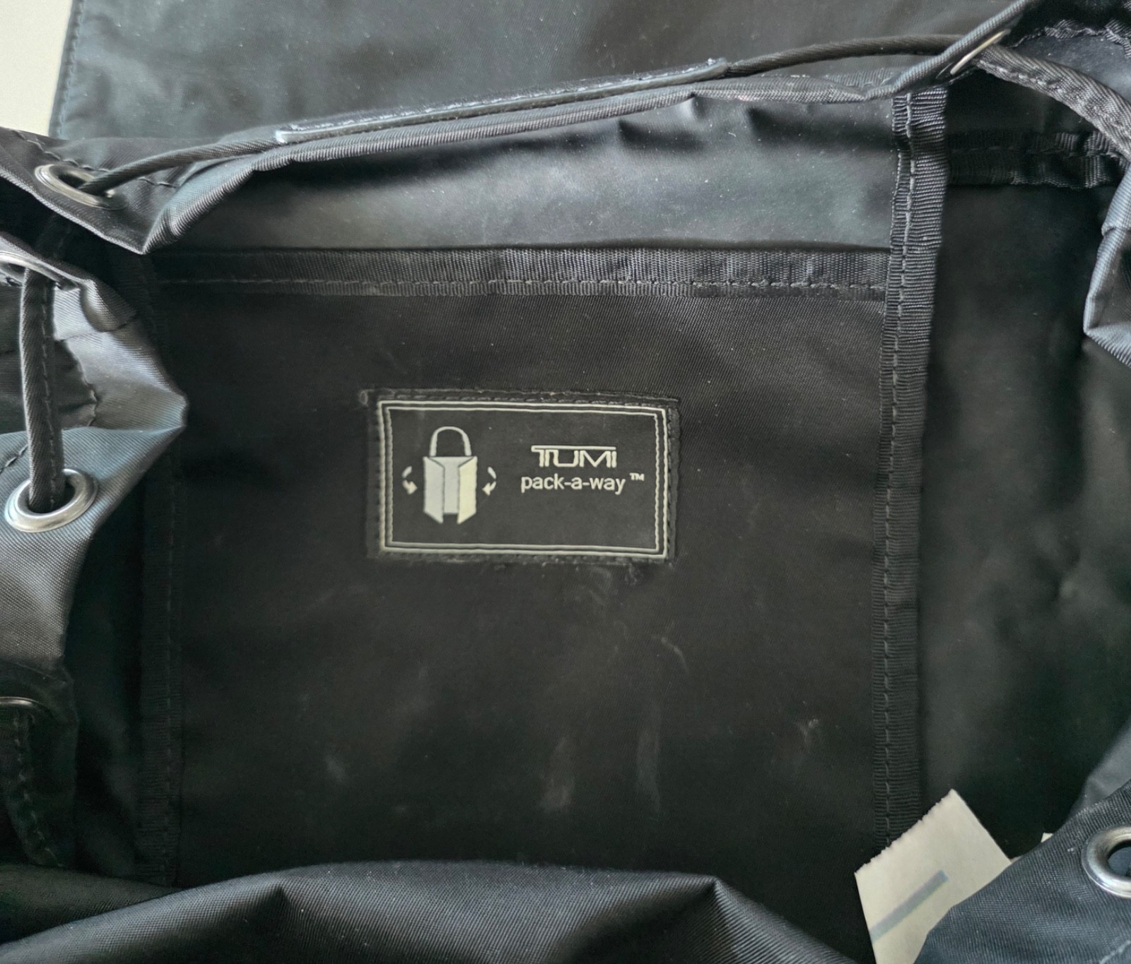Black TUMI Pack−a−Way bag