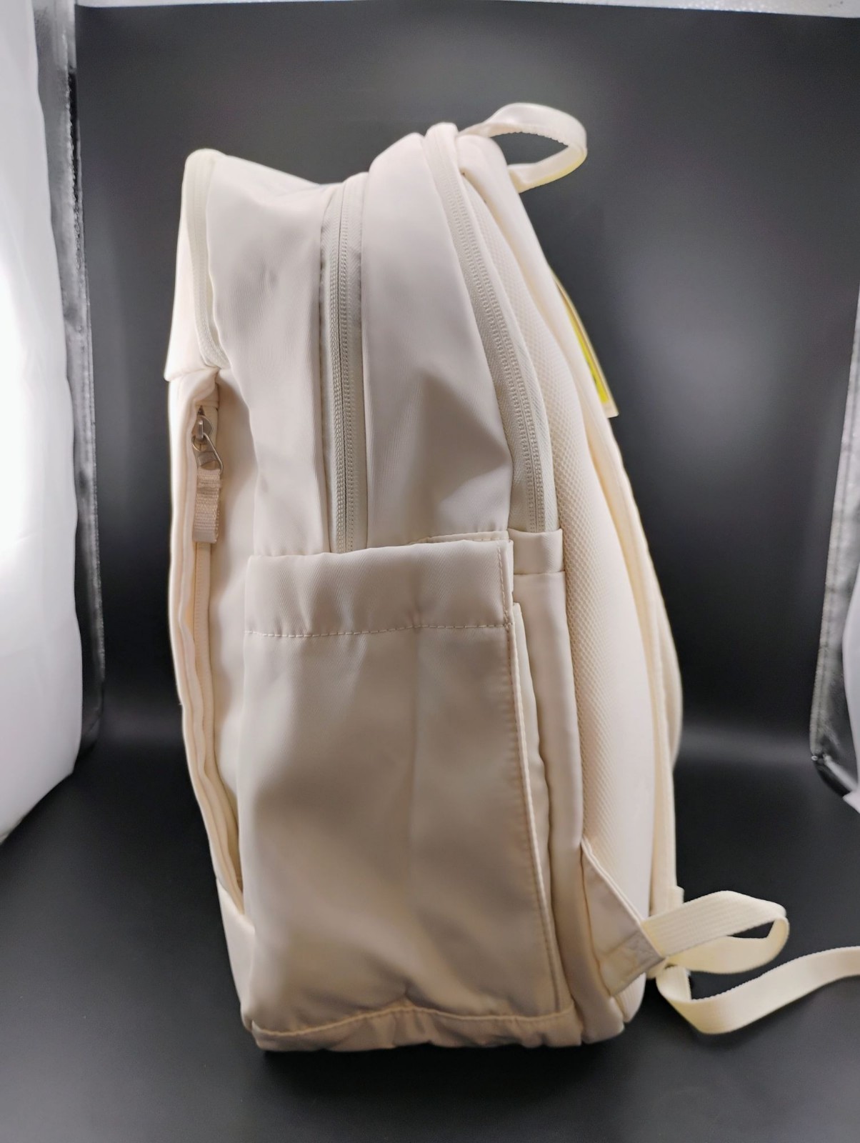 Minimalist Cream Backpack With Multiple Compartments & Padded Straps