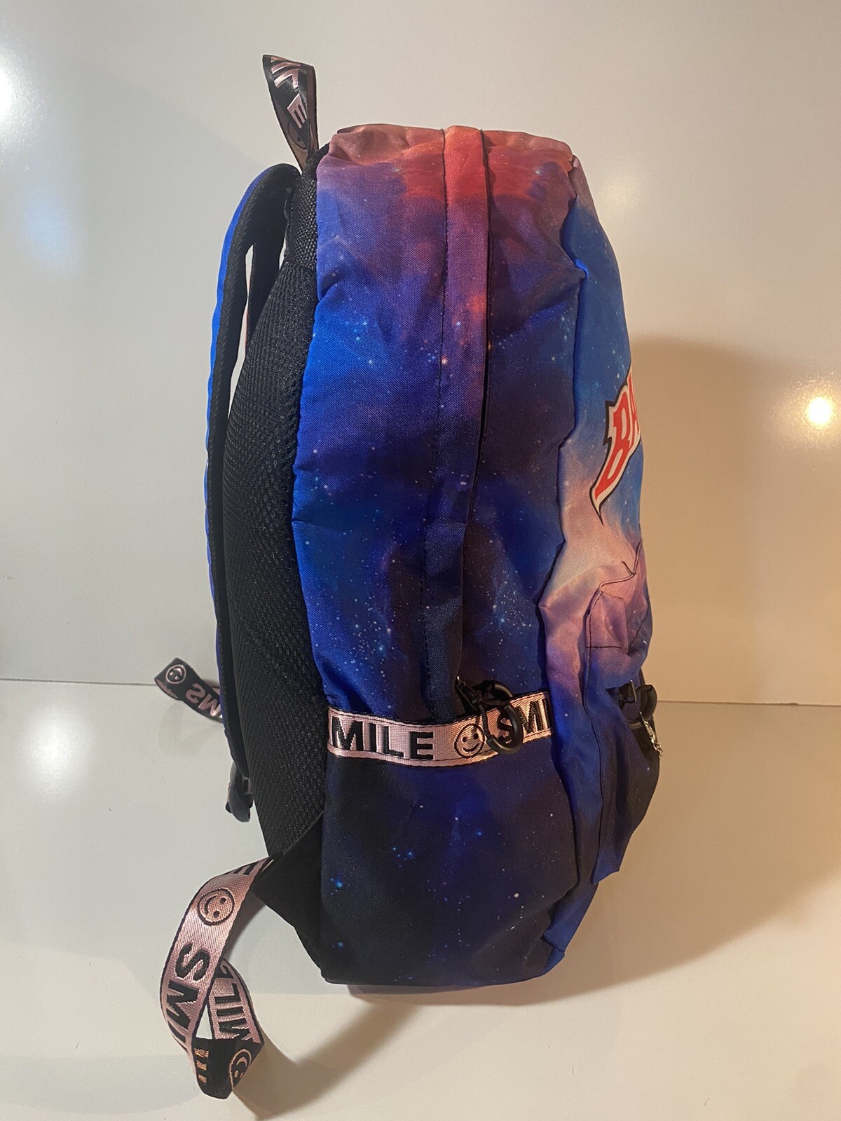 Backwoods Cigars Trippy Outer Space Smile Trim Adjustable Multicolor Backpack