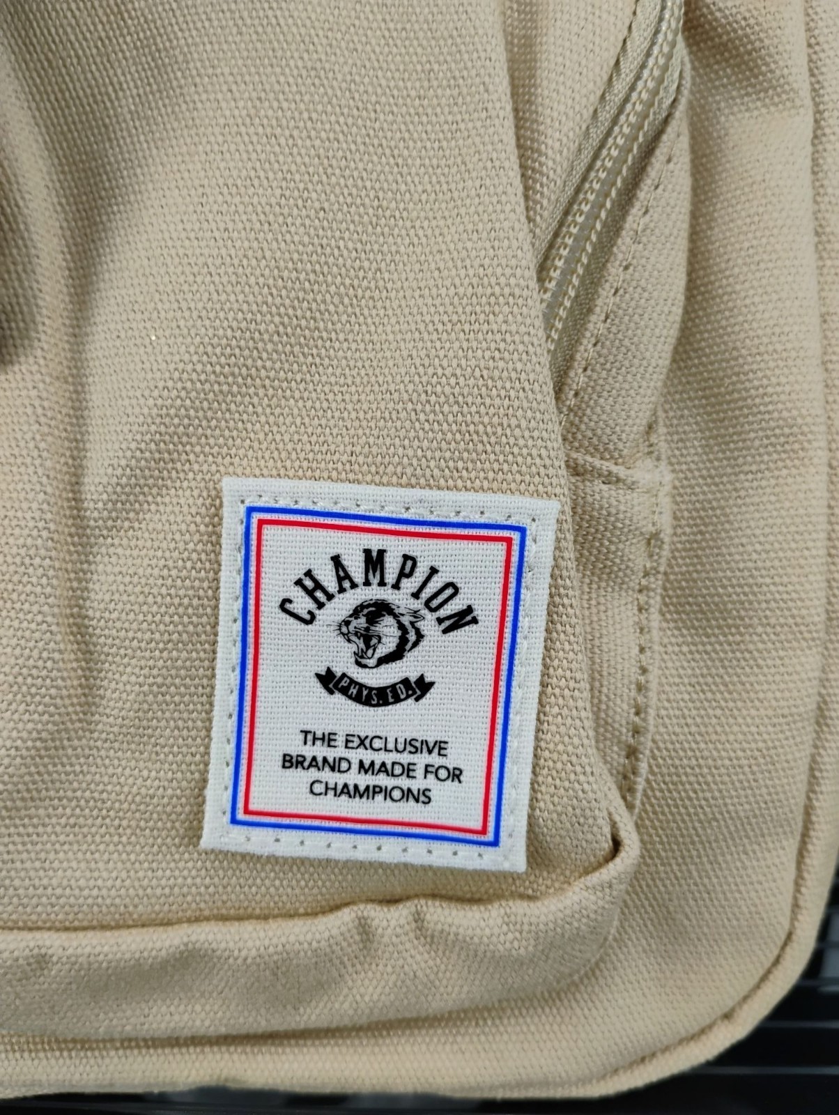 Champion Beige Canvas Sling Backpack Reversible Strap Durable