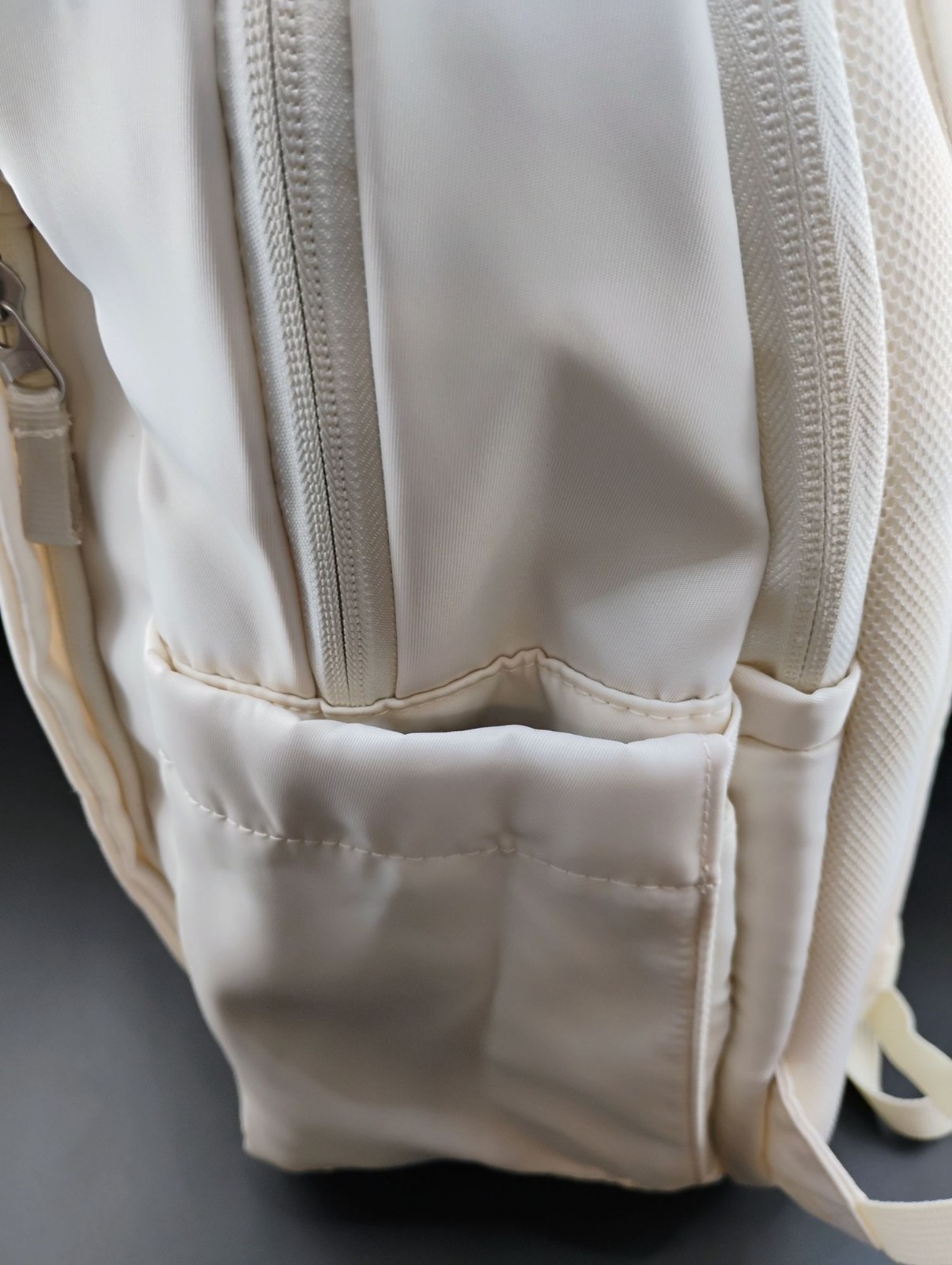 Minimalist Cream Backpack With Multiple Compartments & Padded Straps