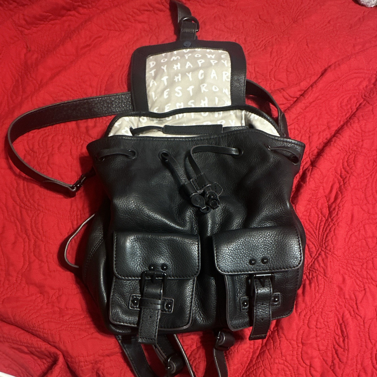 Black Drawstring Backpack with Buckle Flap, Pockets, Adjustable Strap