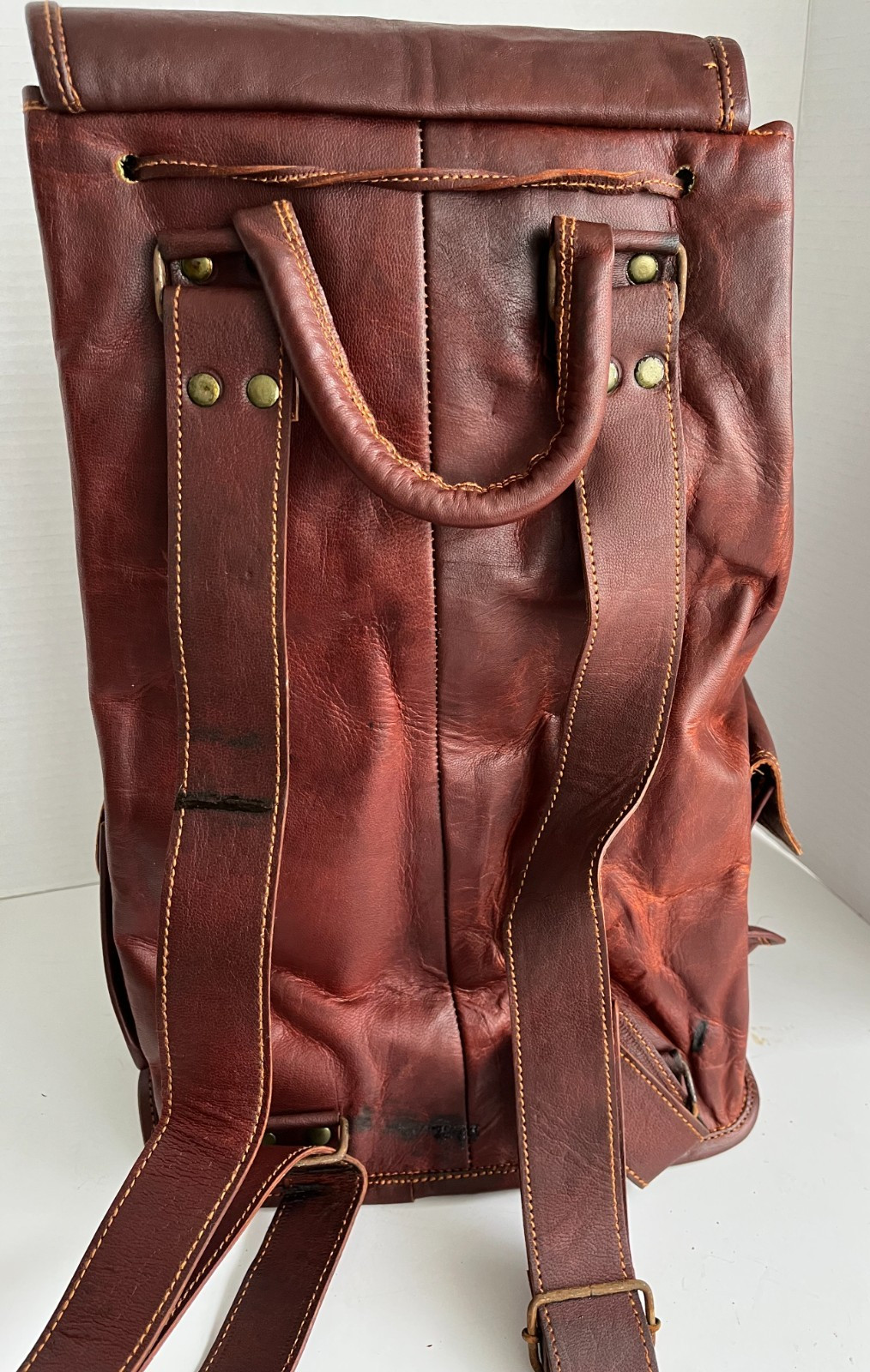 Brown Leather Rucksack Backpack with Drawstring, Flap & Buckle Closure (India)